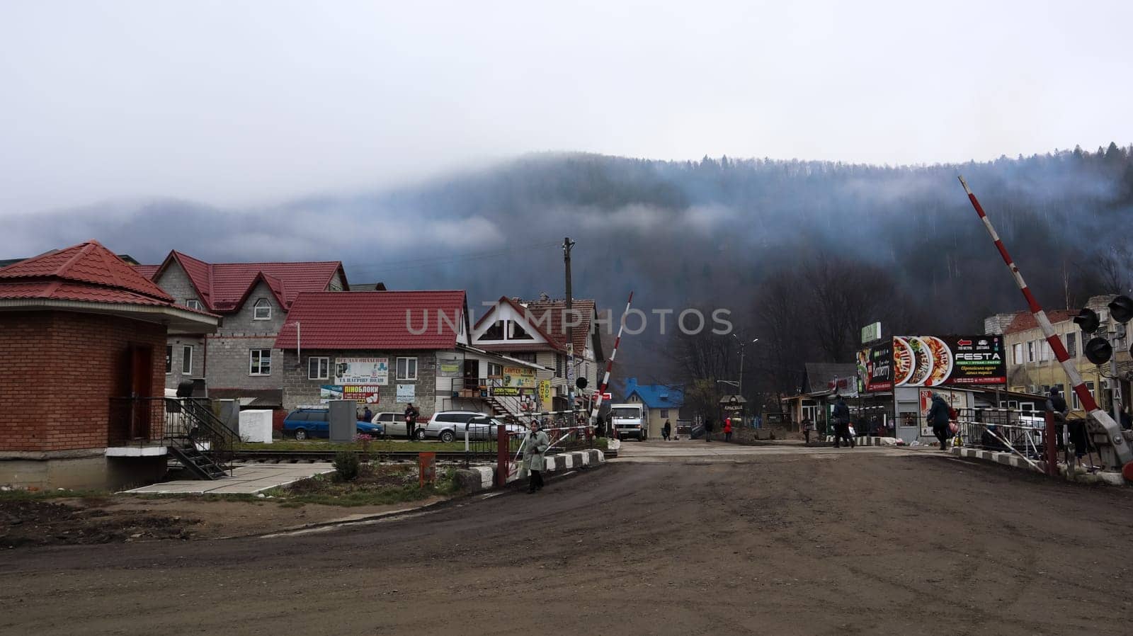 A small town or village of Yaremche among the Carpathians on an autumn afternoon. Ukraine, Yaremche - November 20, 2019