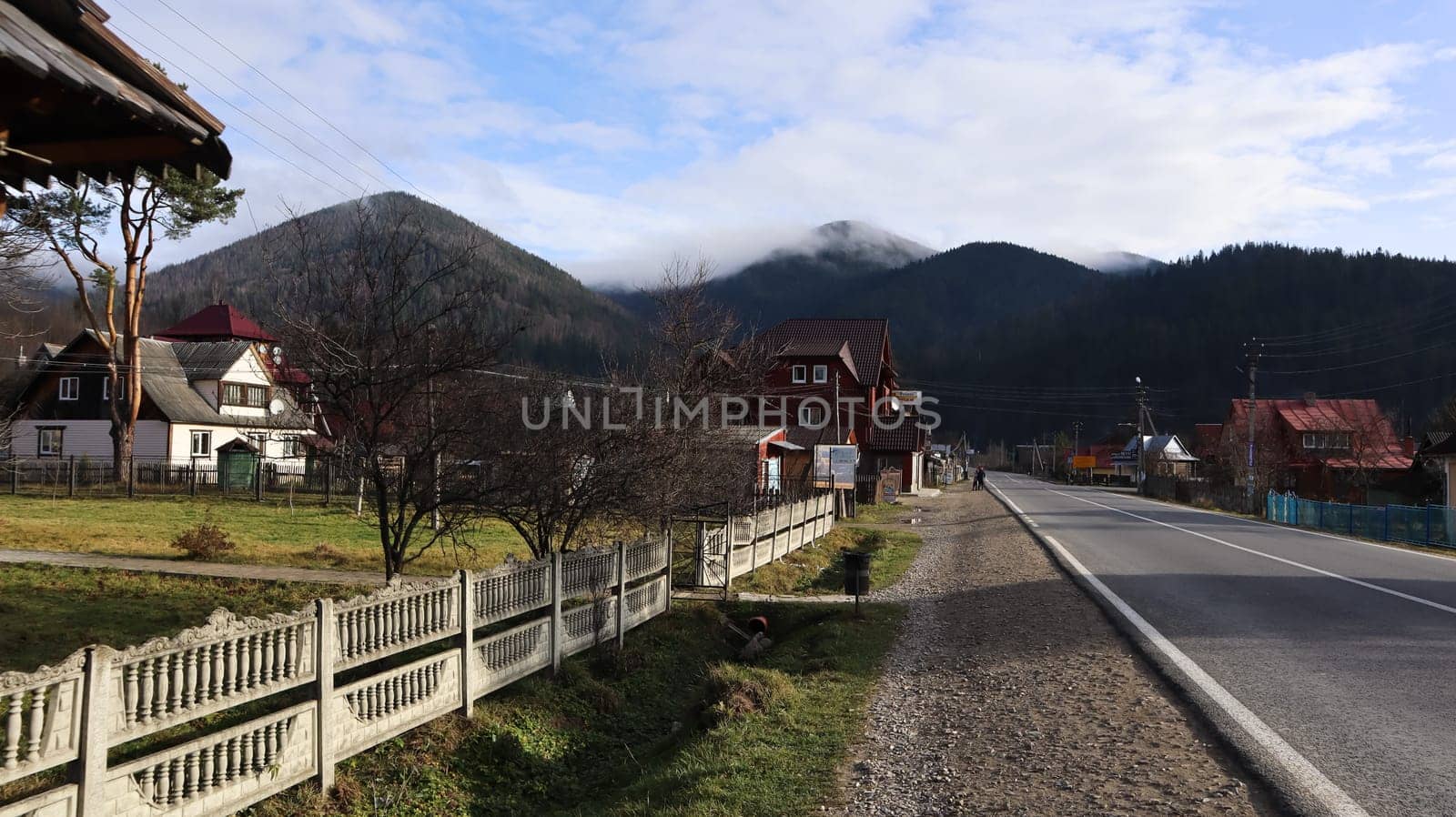 A small town or village of Yaremche among the Carpathians on an autumn afternoon. Ukraine, Yaremche - November 20, 2019