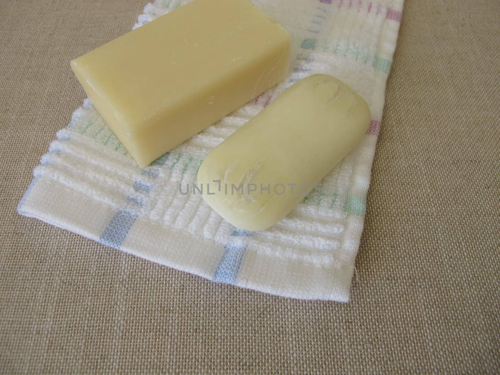 A new soap and a a used soap bar