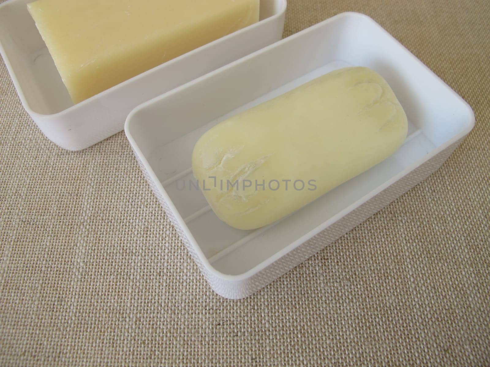 A new soap and a a used soap bar
