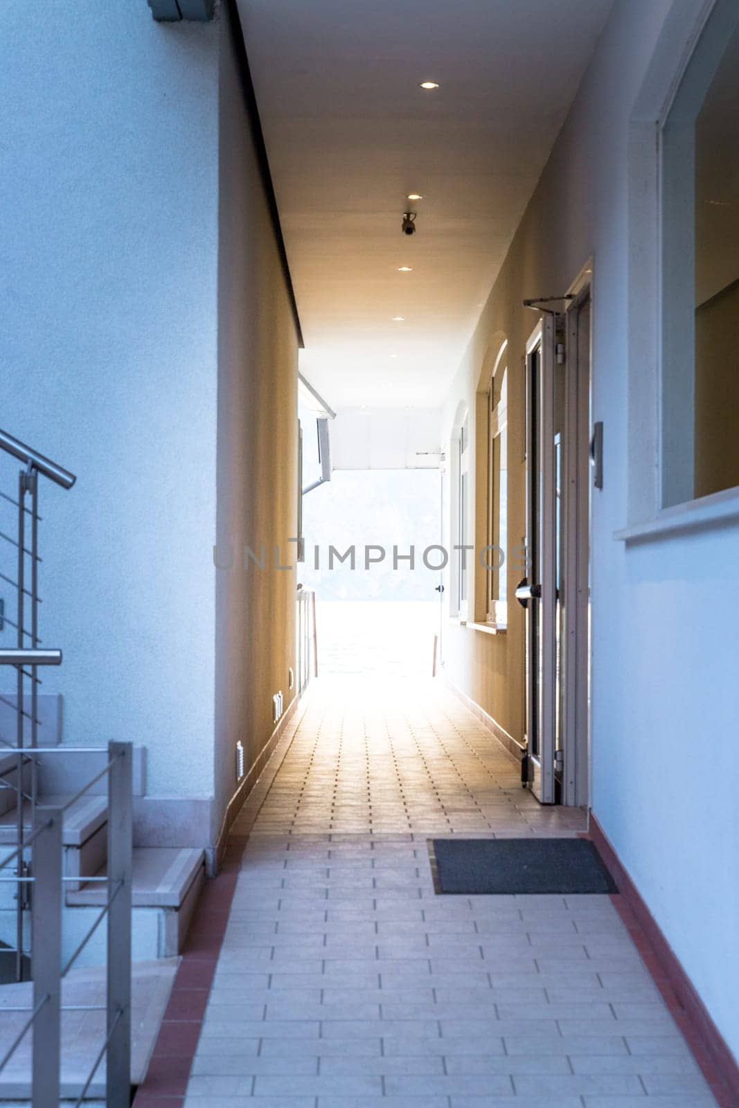 Bright passage between two buildings, natural light
