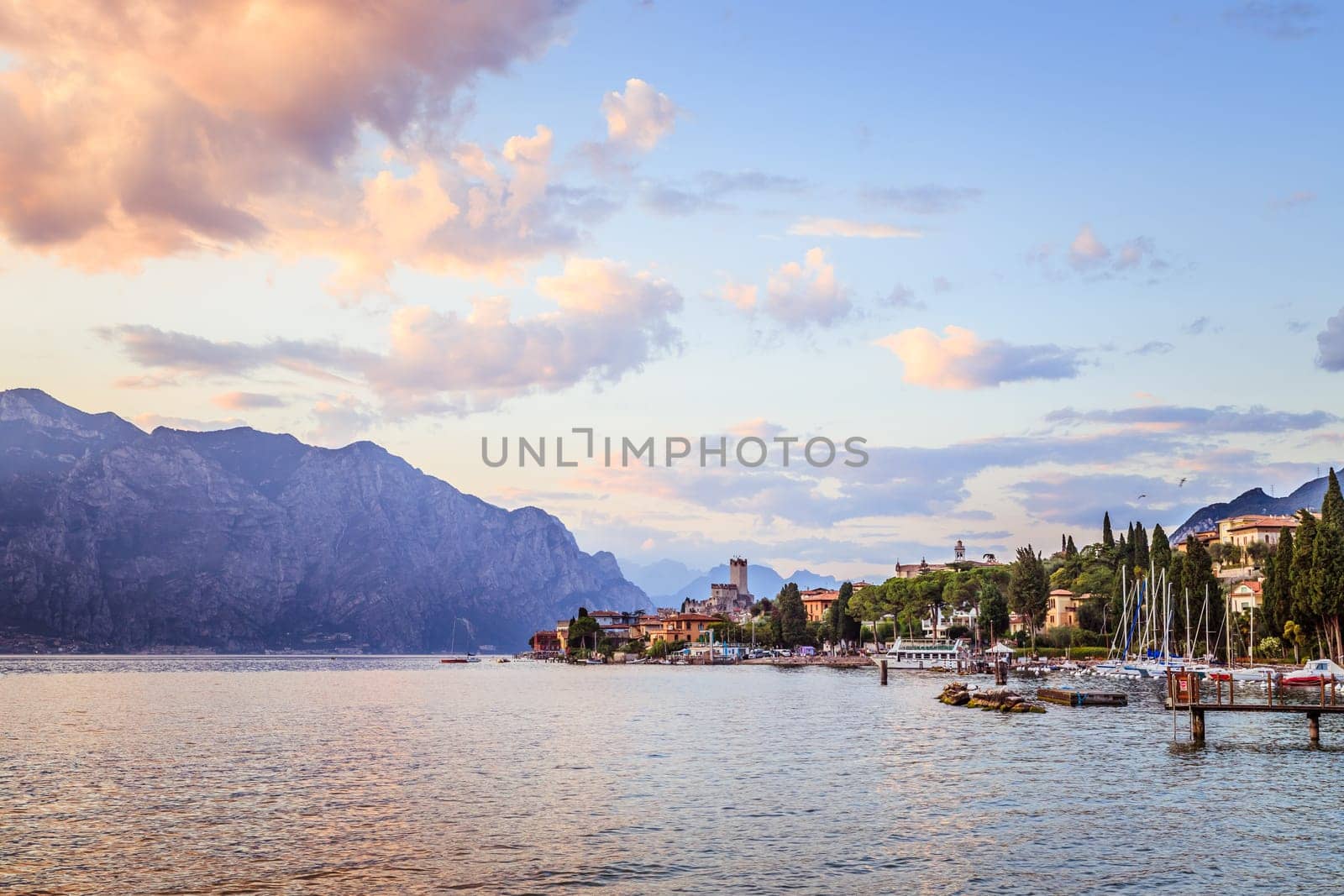 Beautiful evening scenery with cute little village, lago di garda, Italy