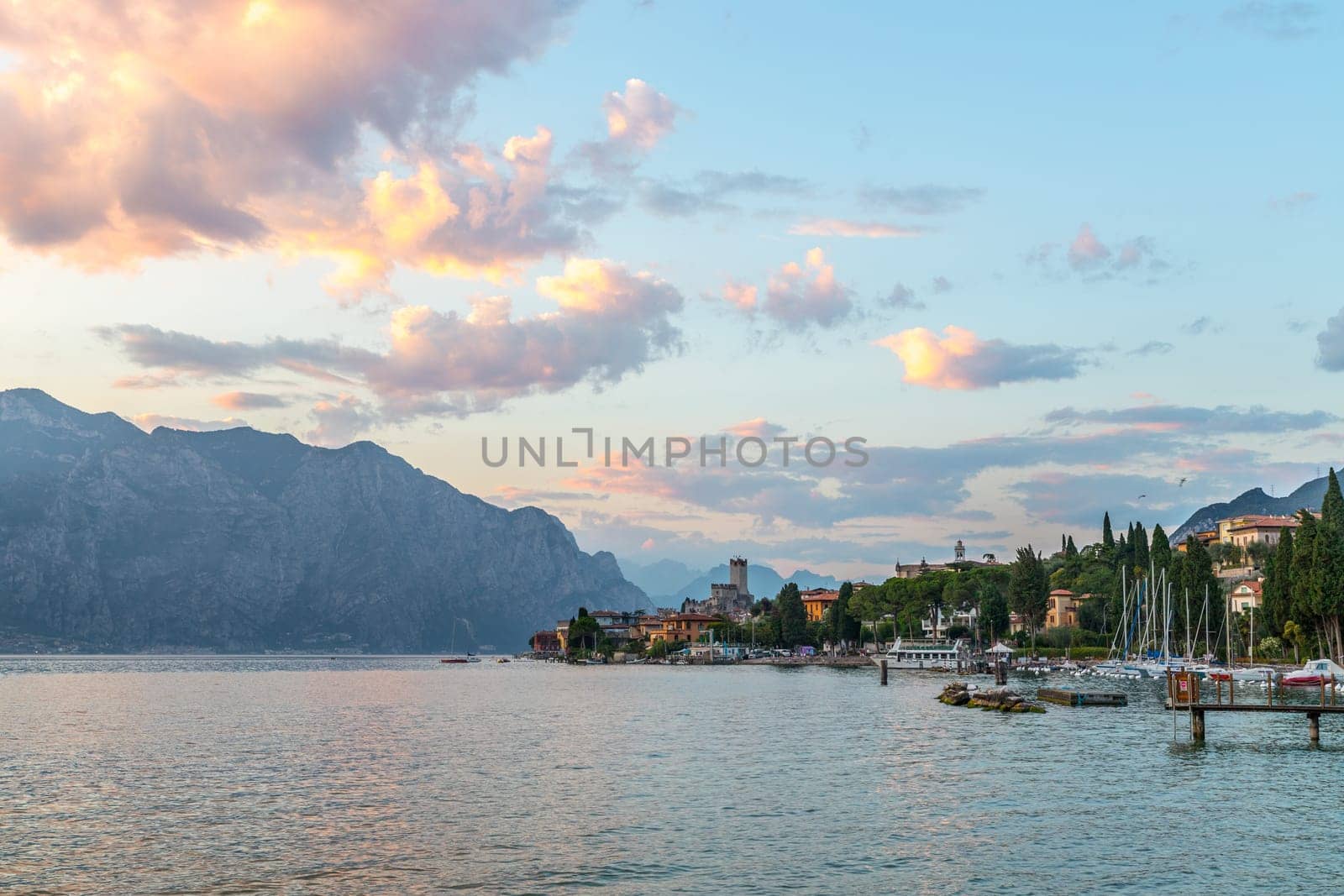 Beautiful evening scenery with cute little village, lago di garda, Italy