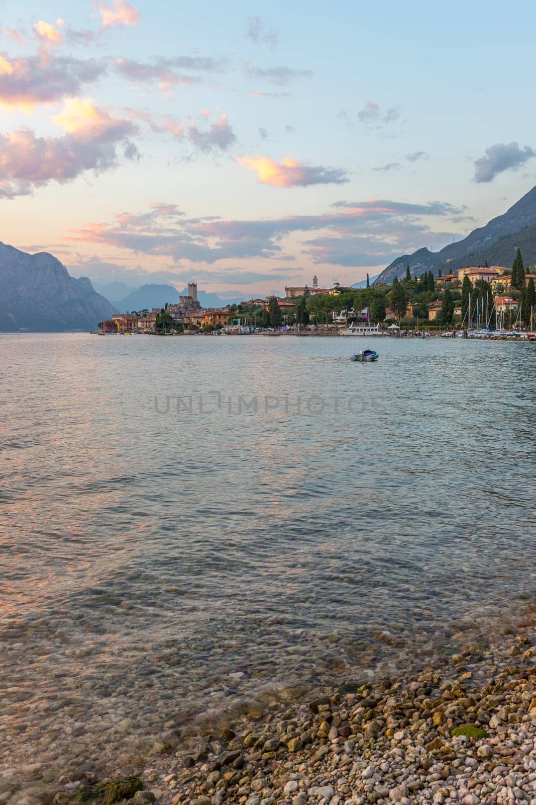 Landscape in Italy: Sunset at lago di garda, Malcesine: Lake, Clouds and village