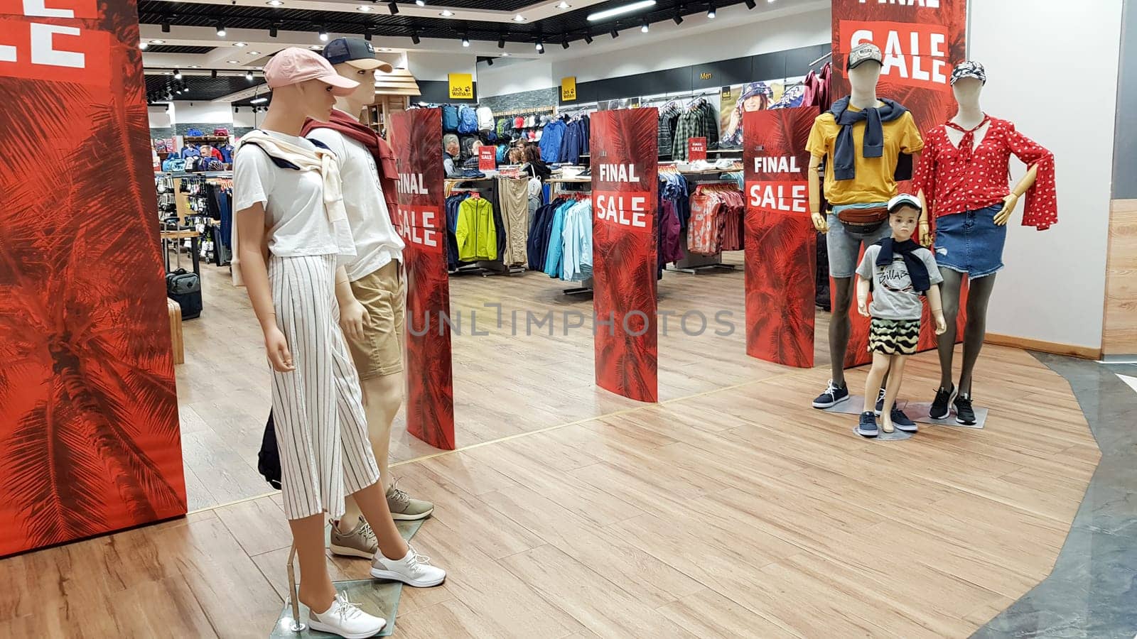 Ukraine, Kiev - September 04, 2019. Sale signs in a shop window in a shopping center on the day of shopping and the international holiday Black Friday, sale and discounts in clothing boutiques.