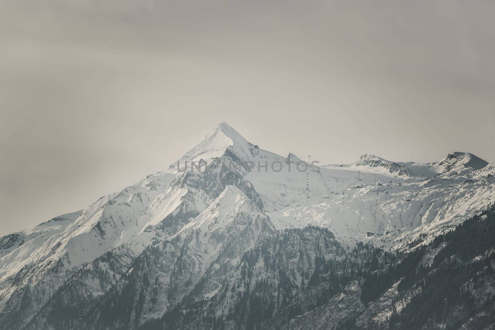 Snowy Kitzsteinhorn in winter, ski lift, Austria