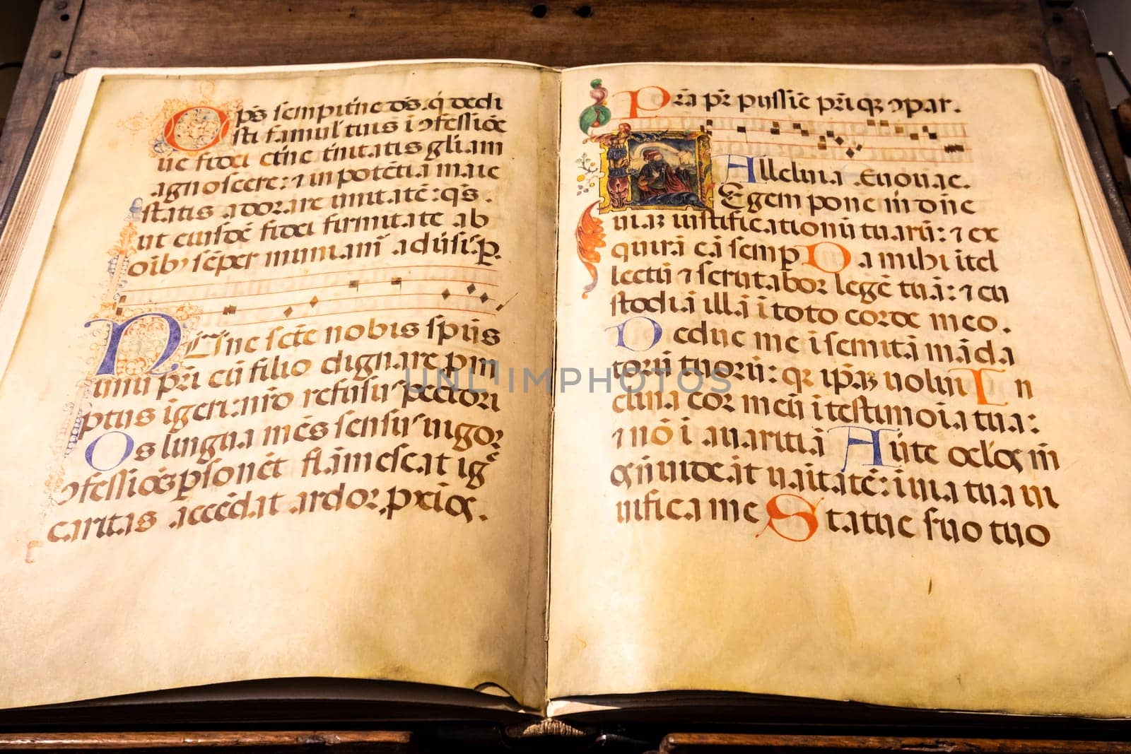 TURIN, ITALY - CIRCA MAY 2021: antique Medieval manuscript with ancient calligraphy.