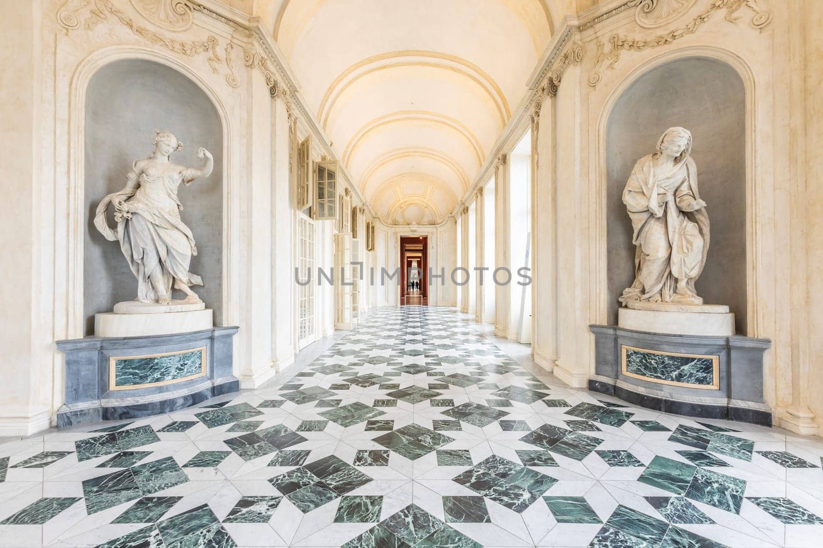 VENARIA REALE, ITALY - CIRCA MAY 2021: corridor with floor made of luxury marbles. Plenty of elegance for this Italian interior in Venaria Reale, Piedmont region.