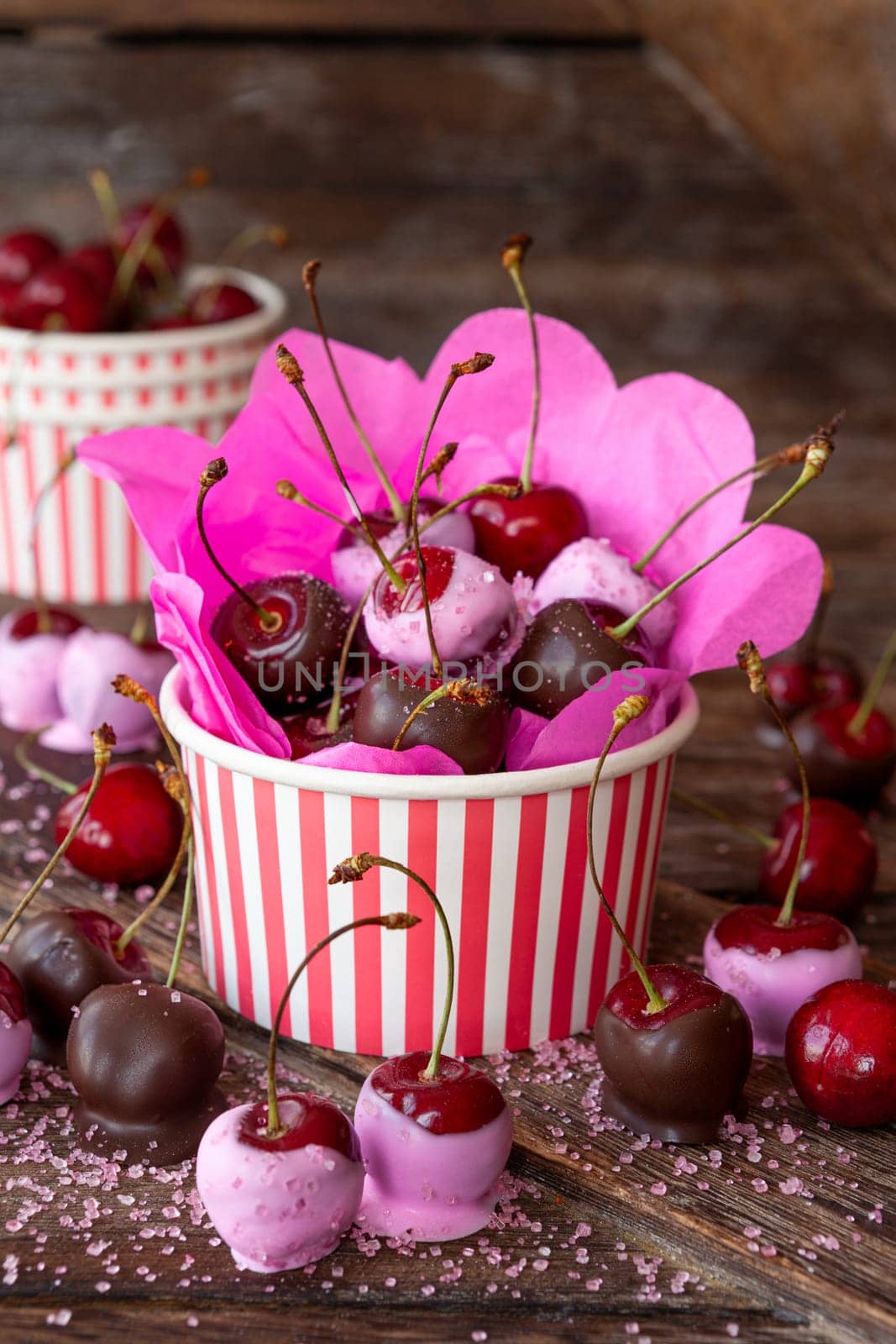 Chocolate covered cherries with pink sugar sprinkles