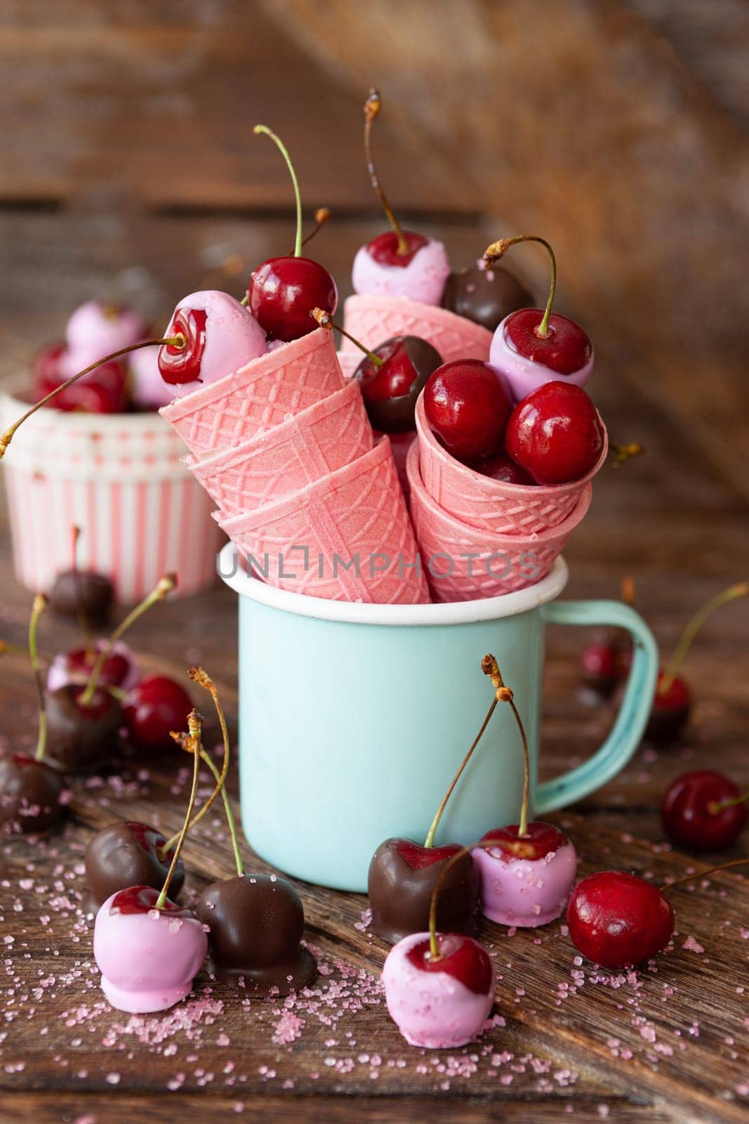 Chocolate covered cherries with pink sugar sprinkles