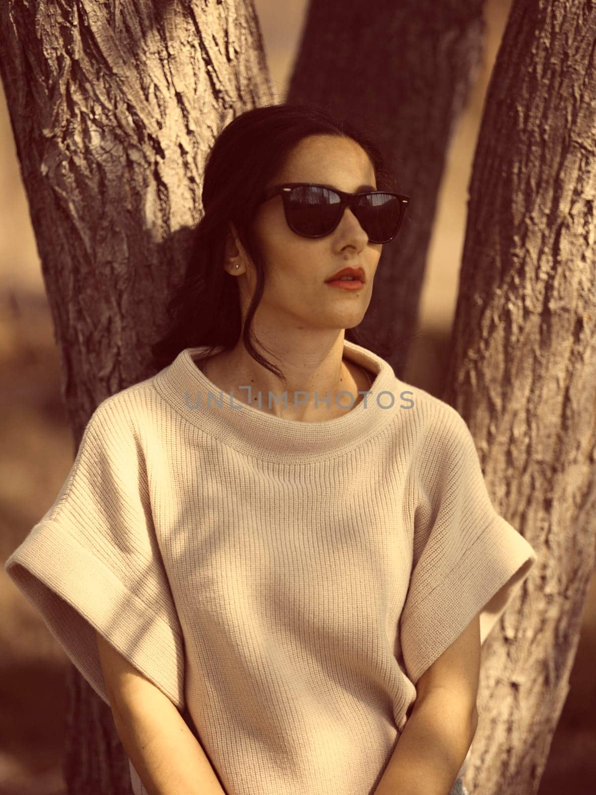 Fashion woman outdoor in spring scenery