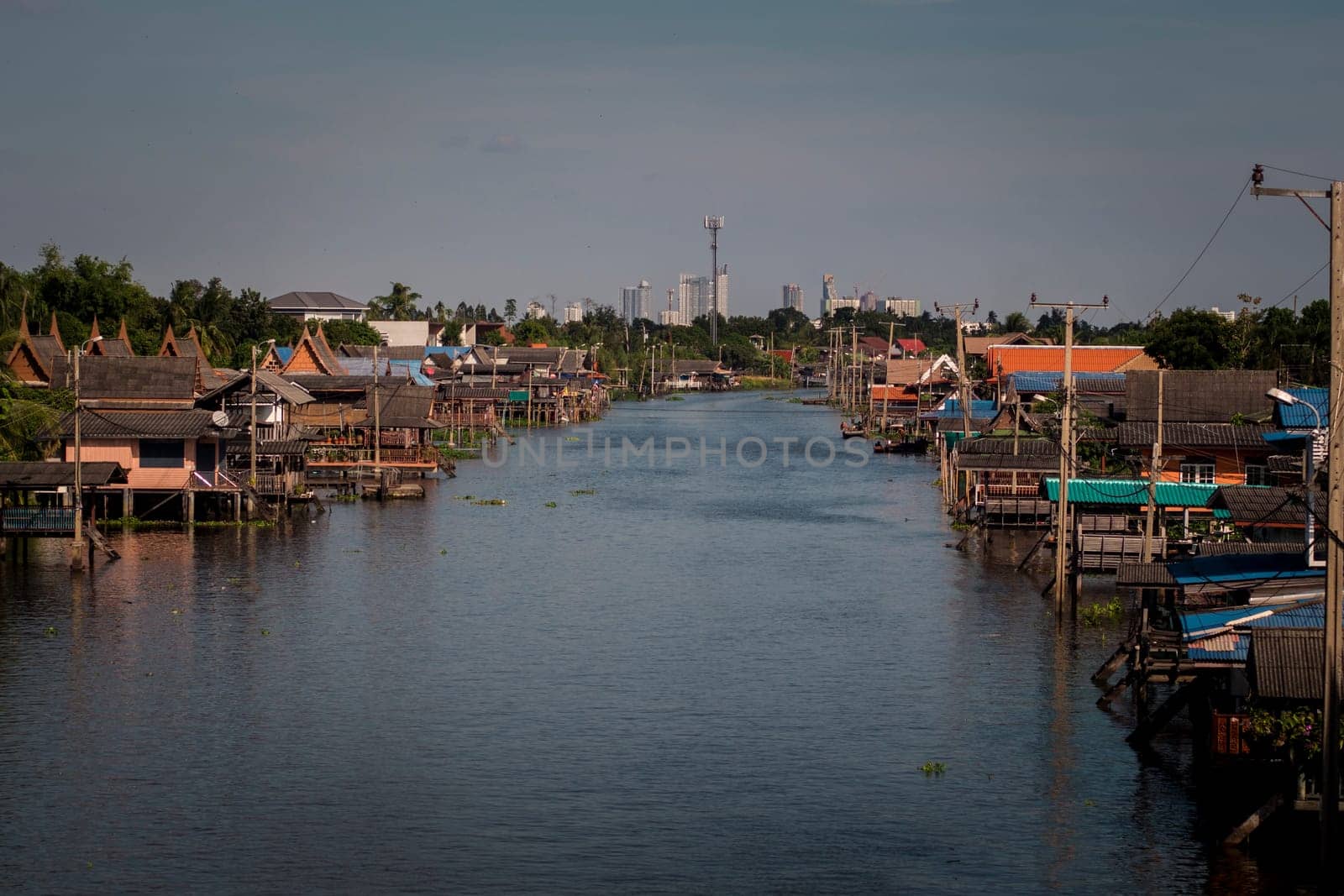 boat for travel in canal, Bangkok Thailand. Community canal in Bangkok Thailand  . Thai traditional houses along canal .Thai lifestyle .travel destination