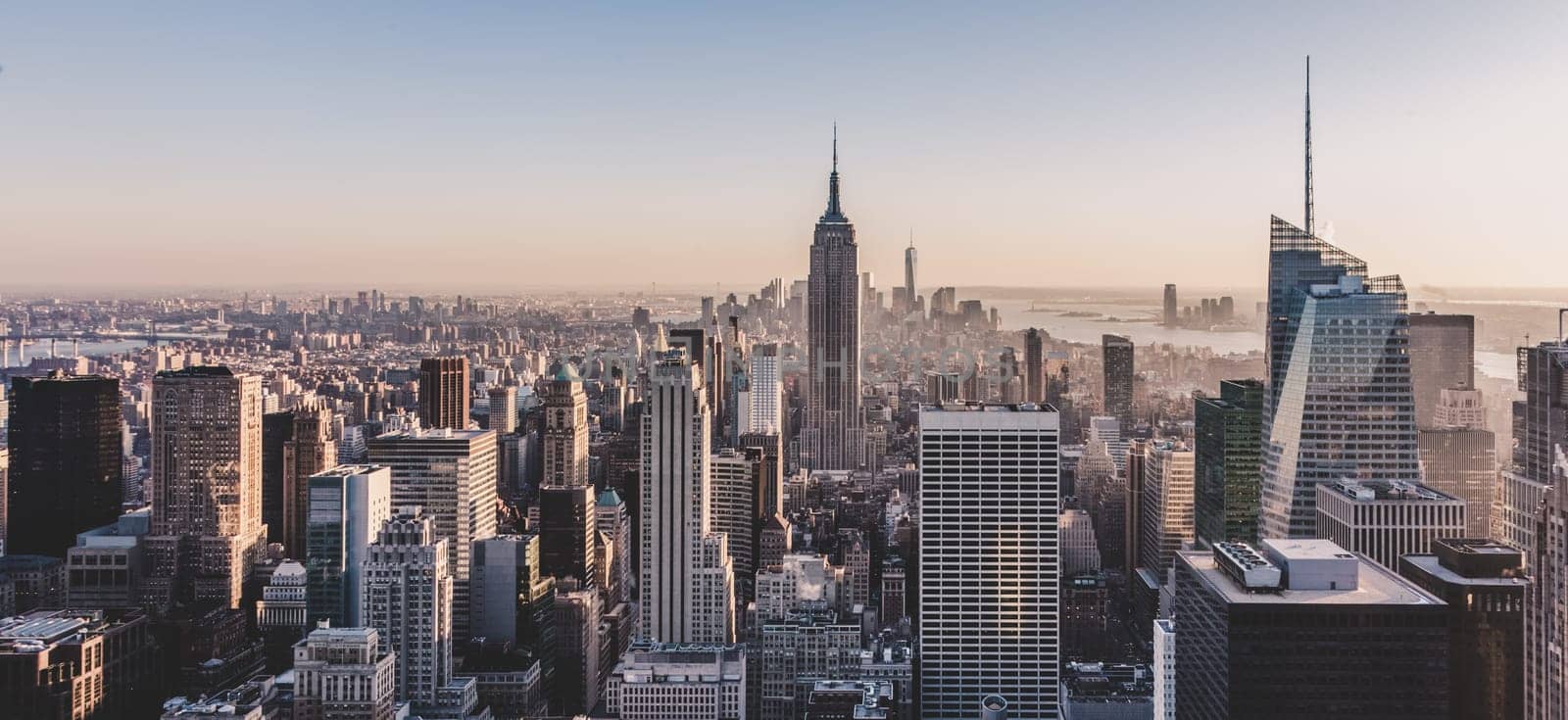 Panoramic view of New York City. Manhattan downtown skyline with Empire State Building and skyscrapers.