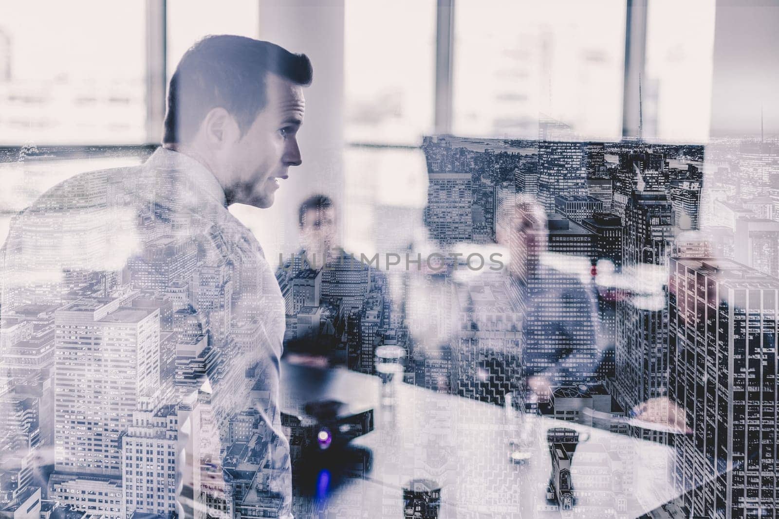 Business man making presentation at office. Executive delivering presentation to his colleagues during meeting or in-house business training, explaining business plans to his employees.