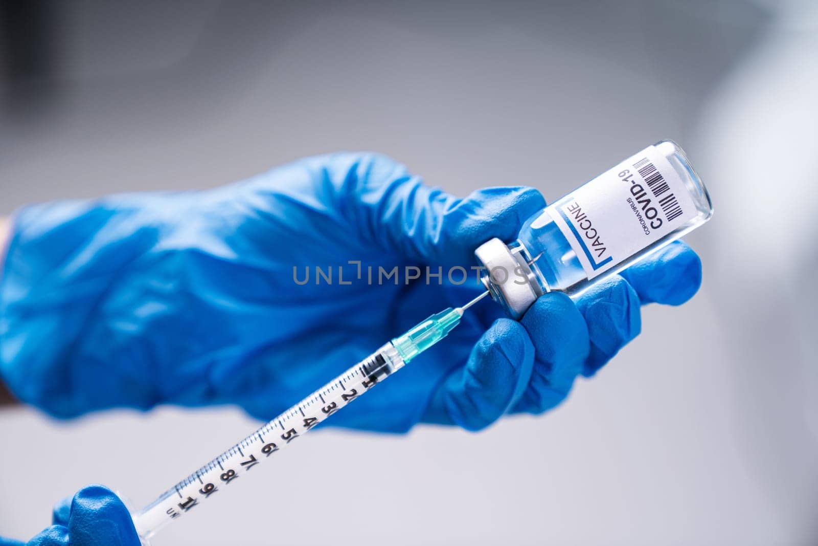 selective focus on hand using sars-cov-2 vaccine