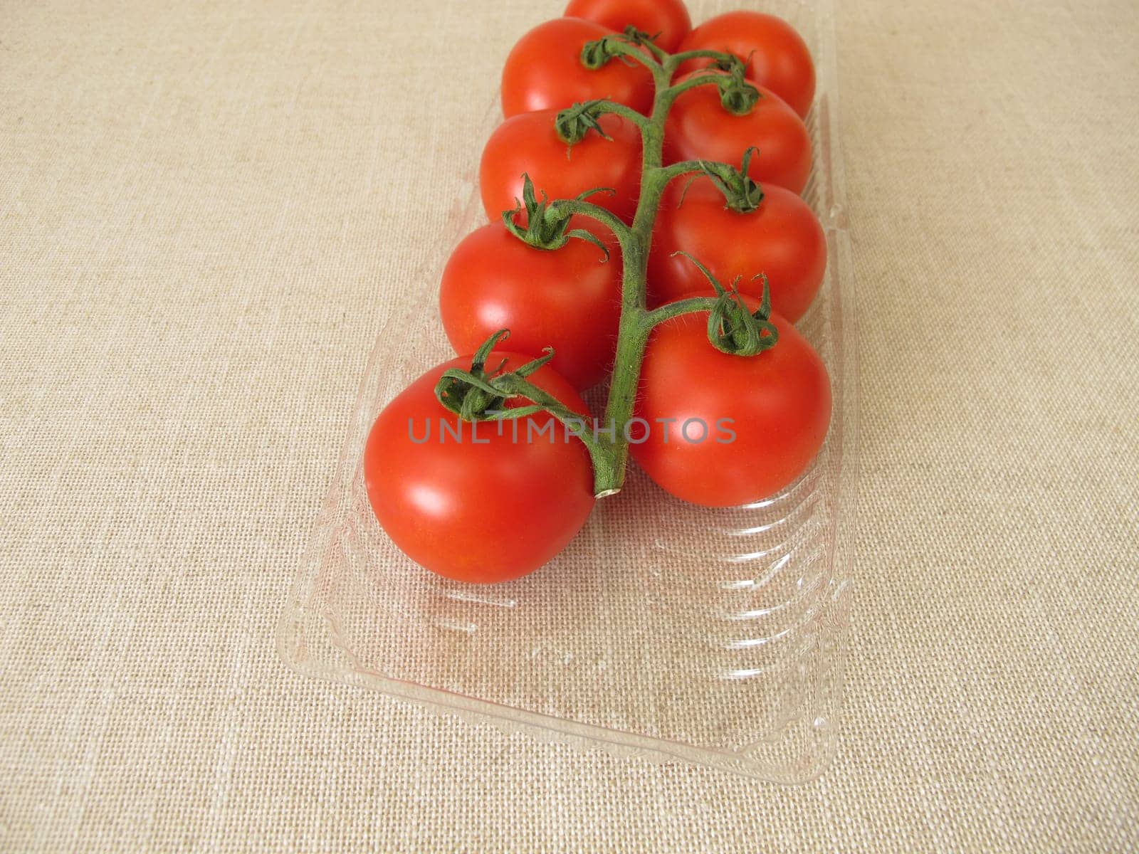 Tomatoes in a plastic package, plastic tray