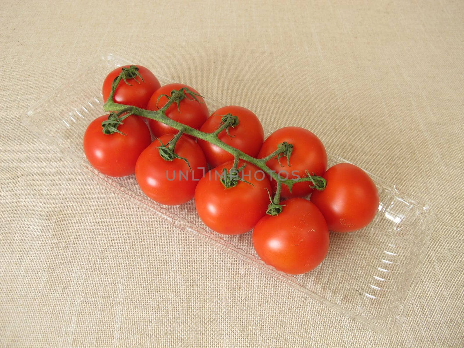Tomatoes in a plastic package, plastic tray