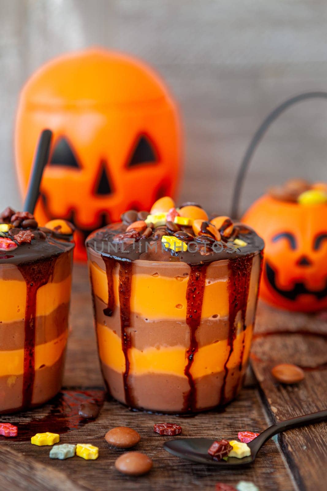 Colorful pudding dessert with sugar sprinkles for Halloween