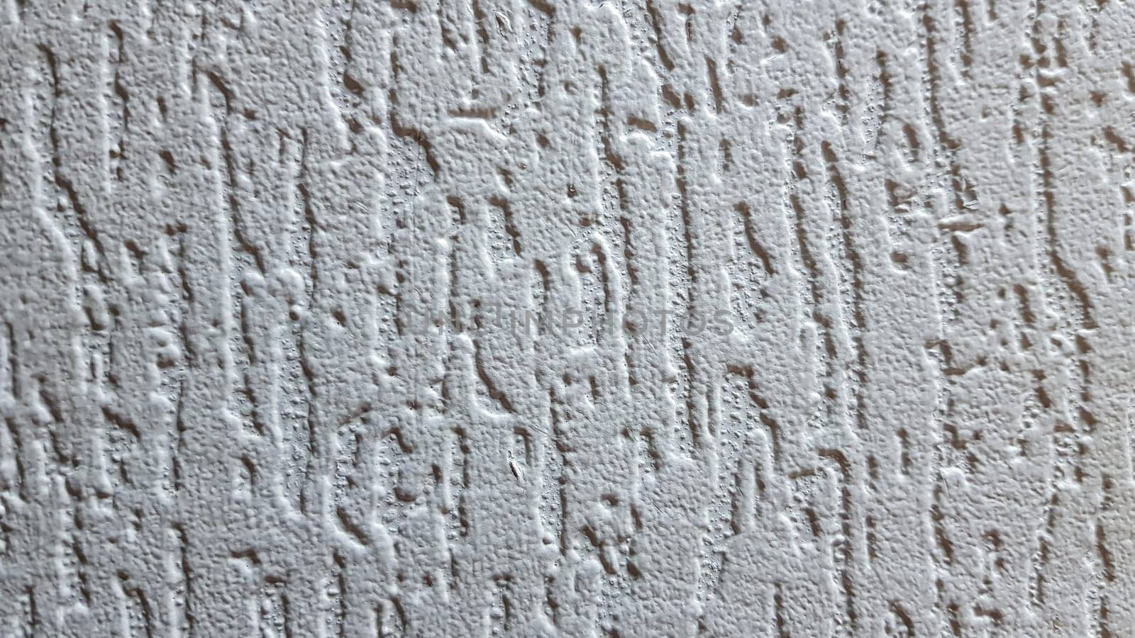 Texture of gray decorative plaster or concrete. Abstract background for design. Decorative plaster effect on wall