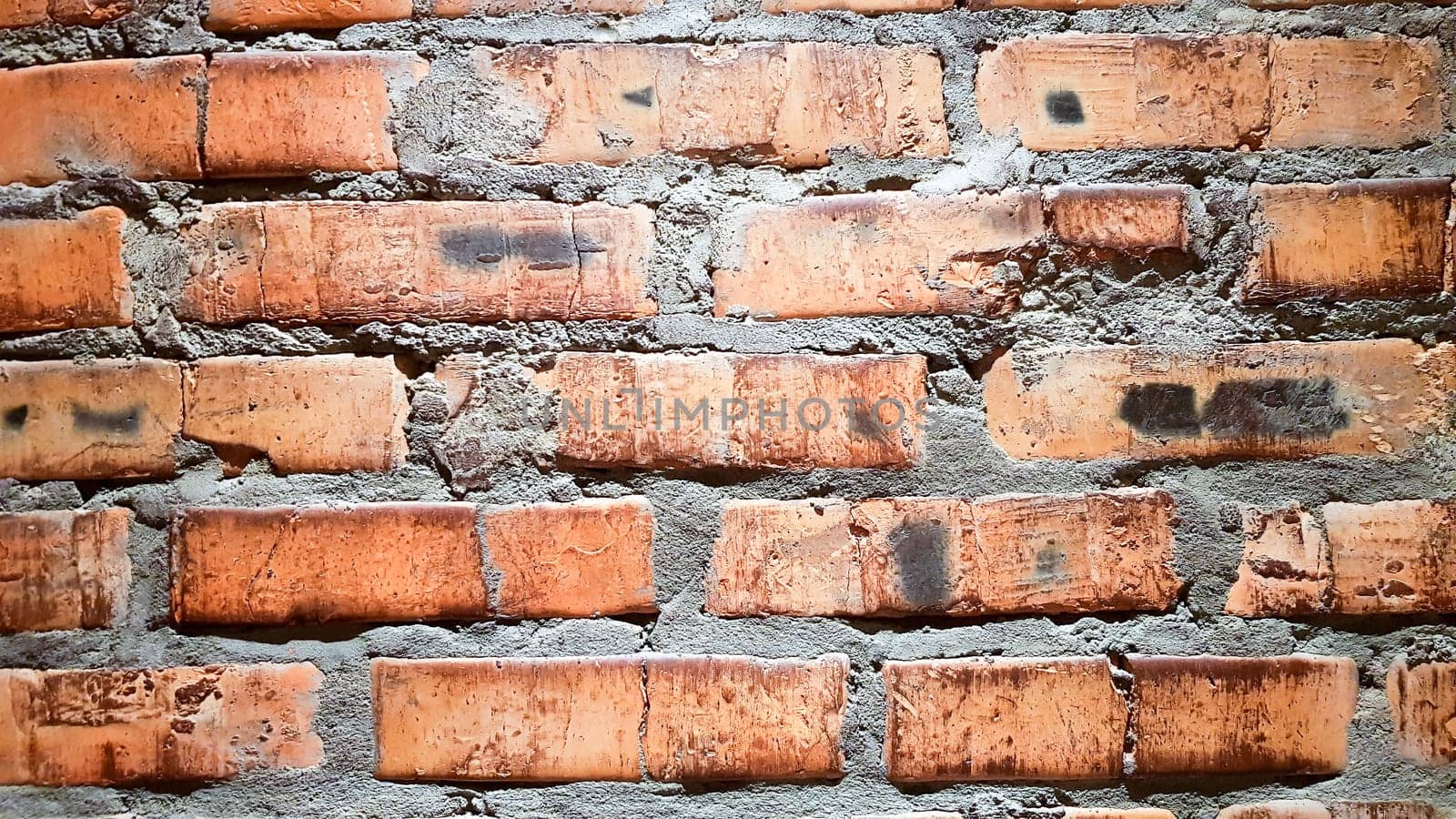 Vintage brick wall background. The red clay brick is beautiful, strong,suitable for decoration as a folk wall, used as a background image