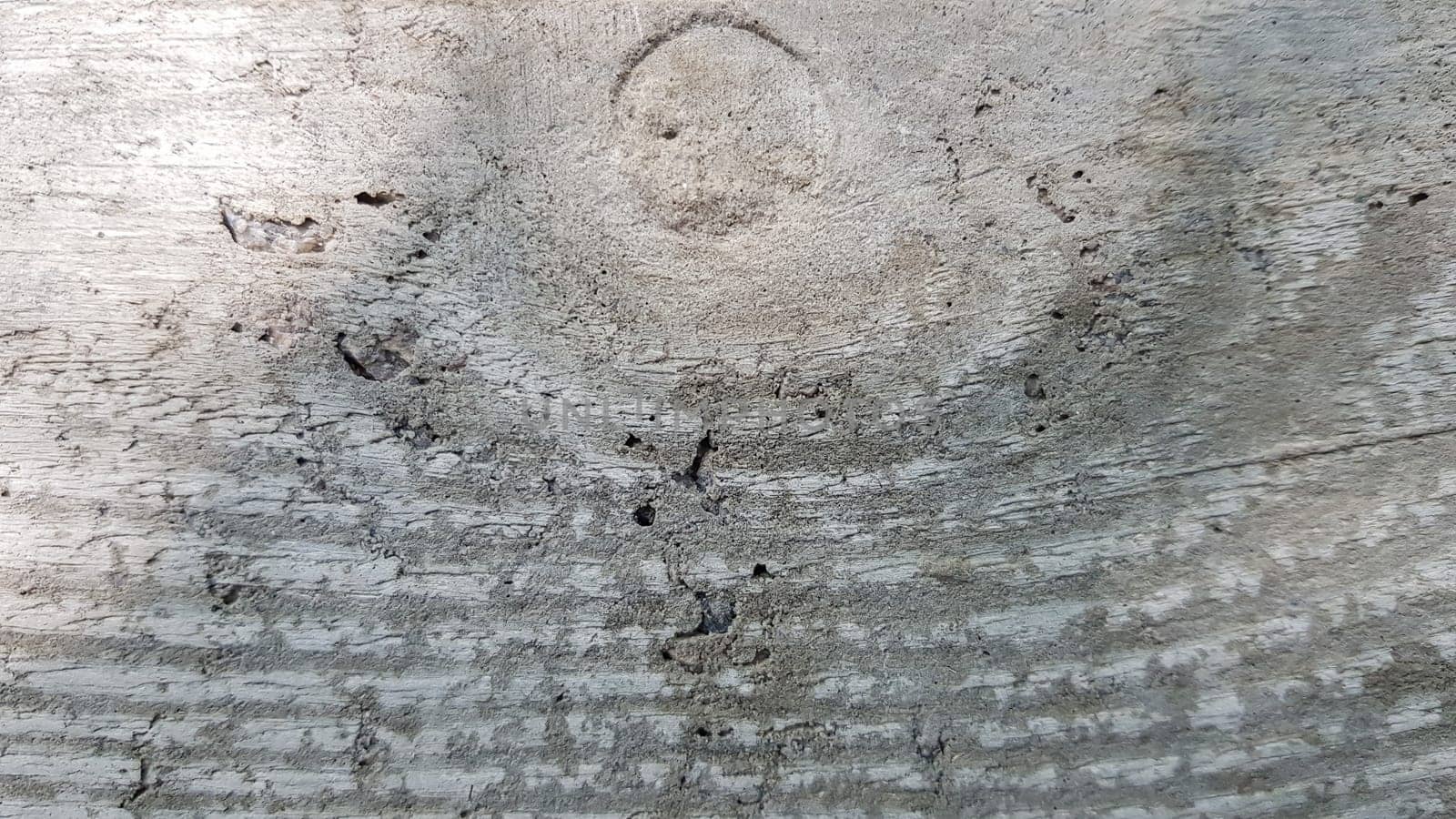 Beautiful concrete background with wood texture. Concrete wall flooring casing wood flooring texture. Mold traces for cement formwork