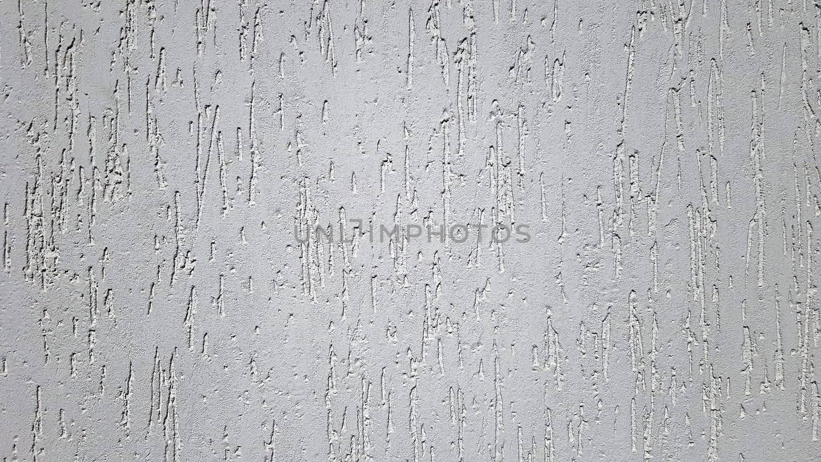 Texture of gray decorative plaster or concrete. Abstract background for design. Decorative plaster effect on wall