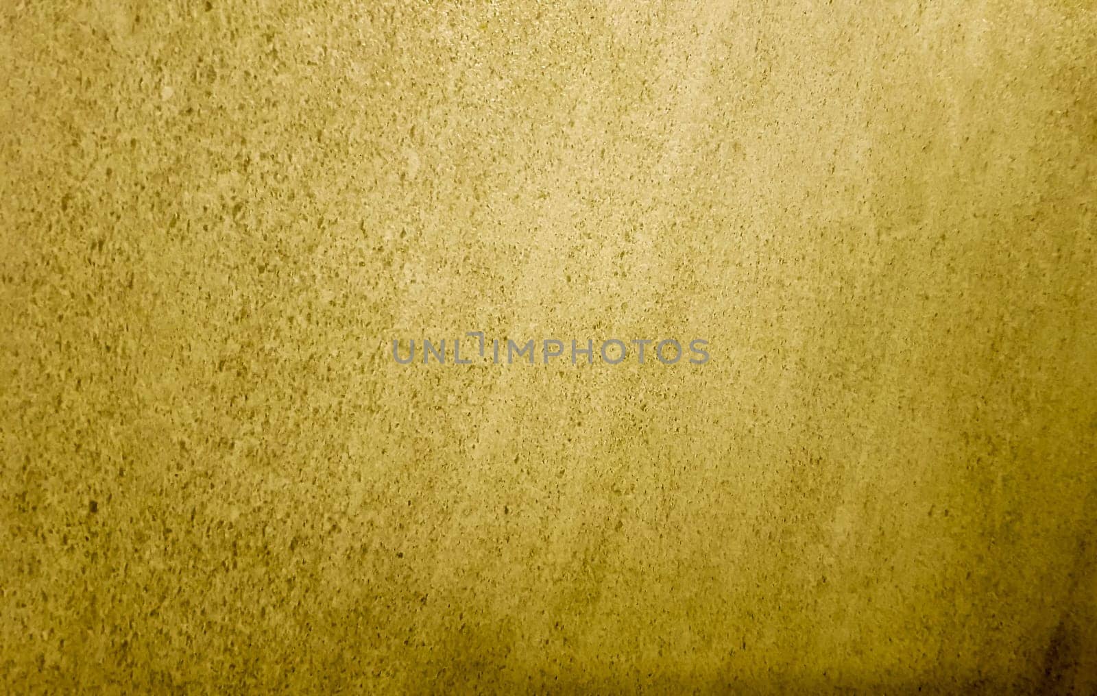 Gold background or texture and gradient shadow. wall and floor gold yellow mosaic tiles texture background. Metal texture background in gold.Panorama gold texture.