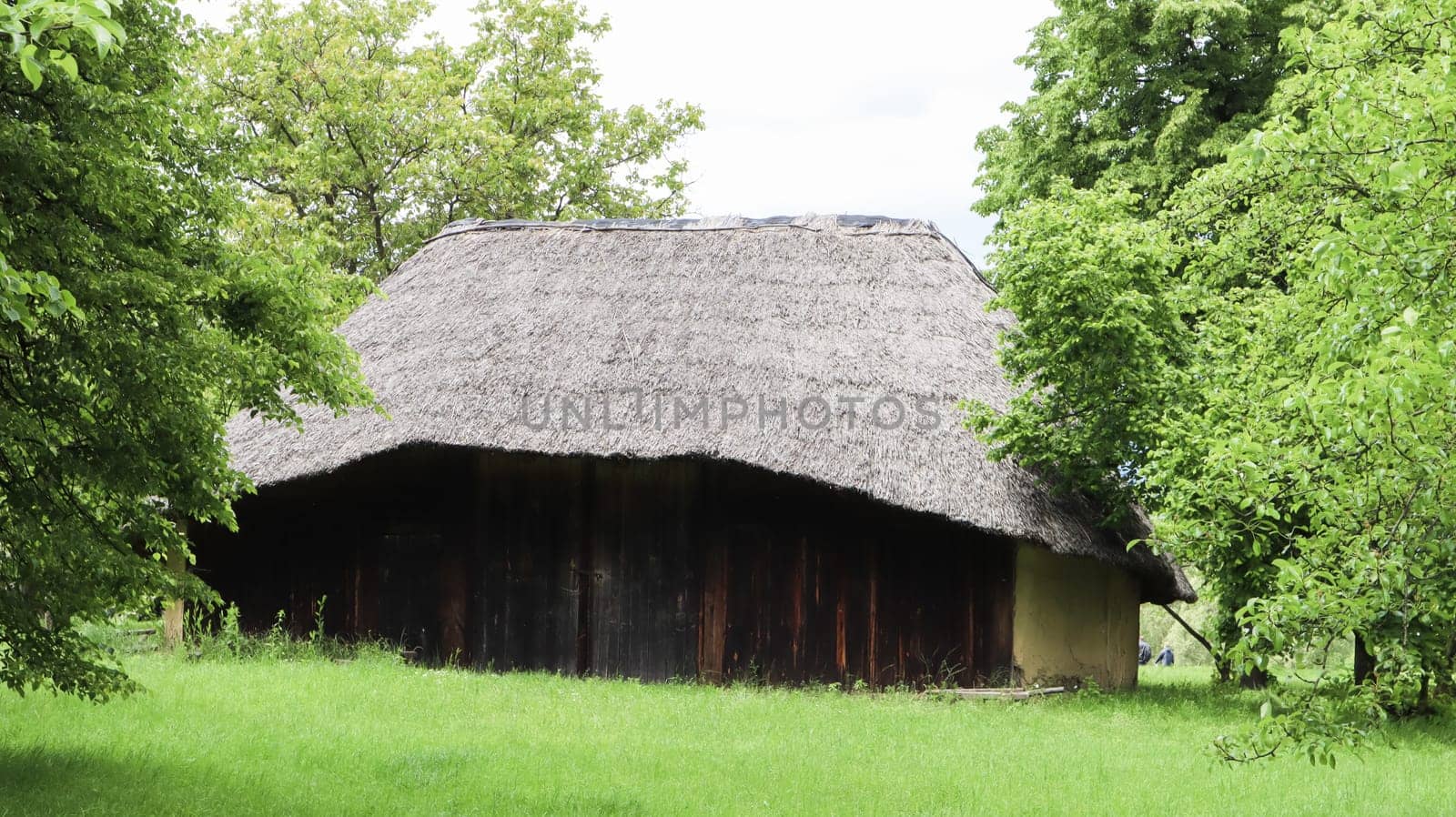 The old house of peasants in the museum Pirogovo or Pirogov. Country estate. National Museum of Folk Architecture and Everyday Life of Traditional Folklore Houses of Different Regions of Ukraine.