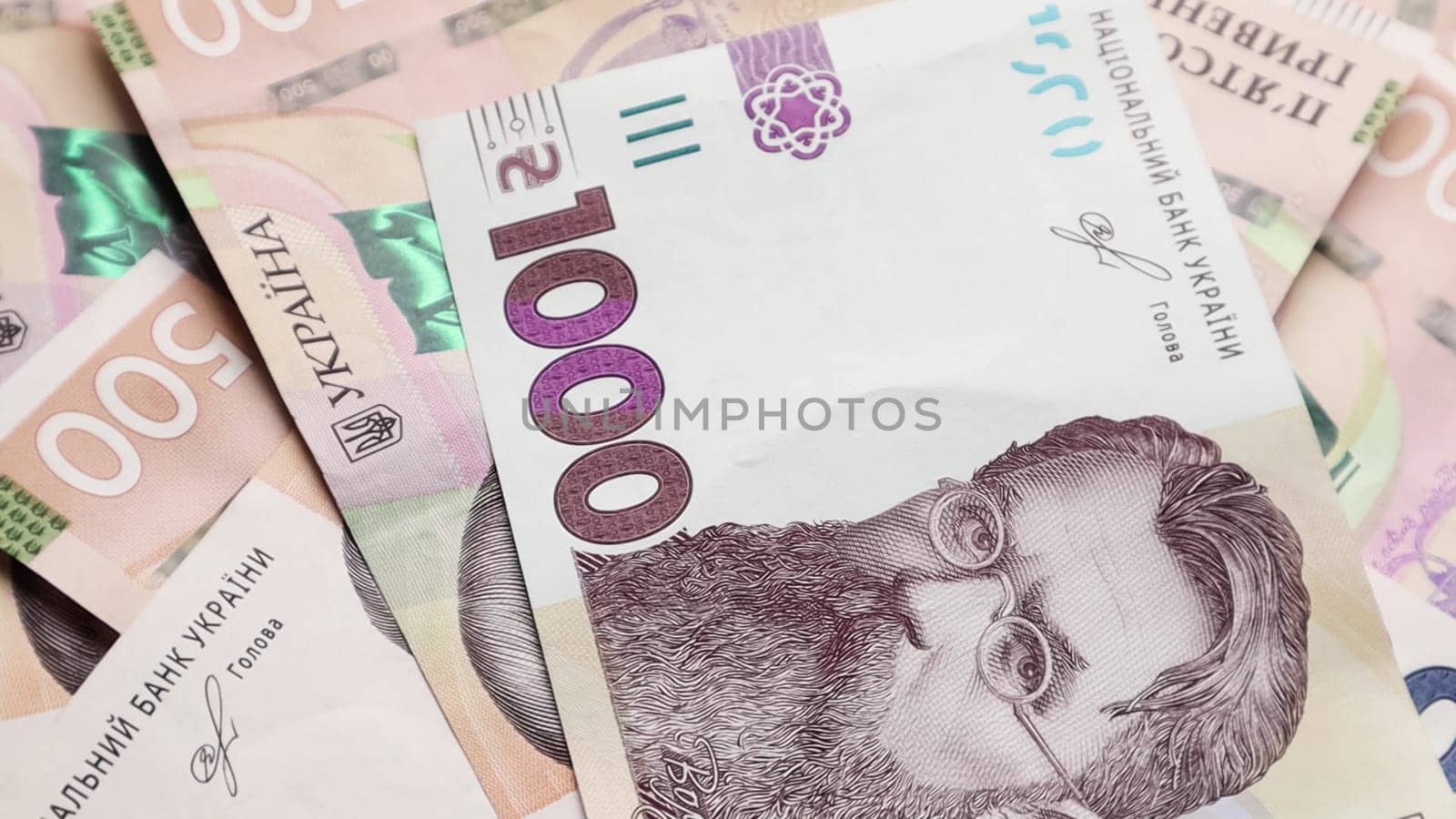 One paper bill of 1000 hryvnia. Portrait of Vladimir Ivanovich Vernadsky on the Ukrainian banknote. Ukrainian money. Money background.