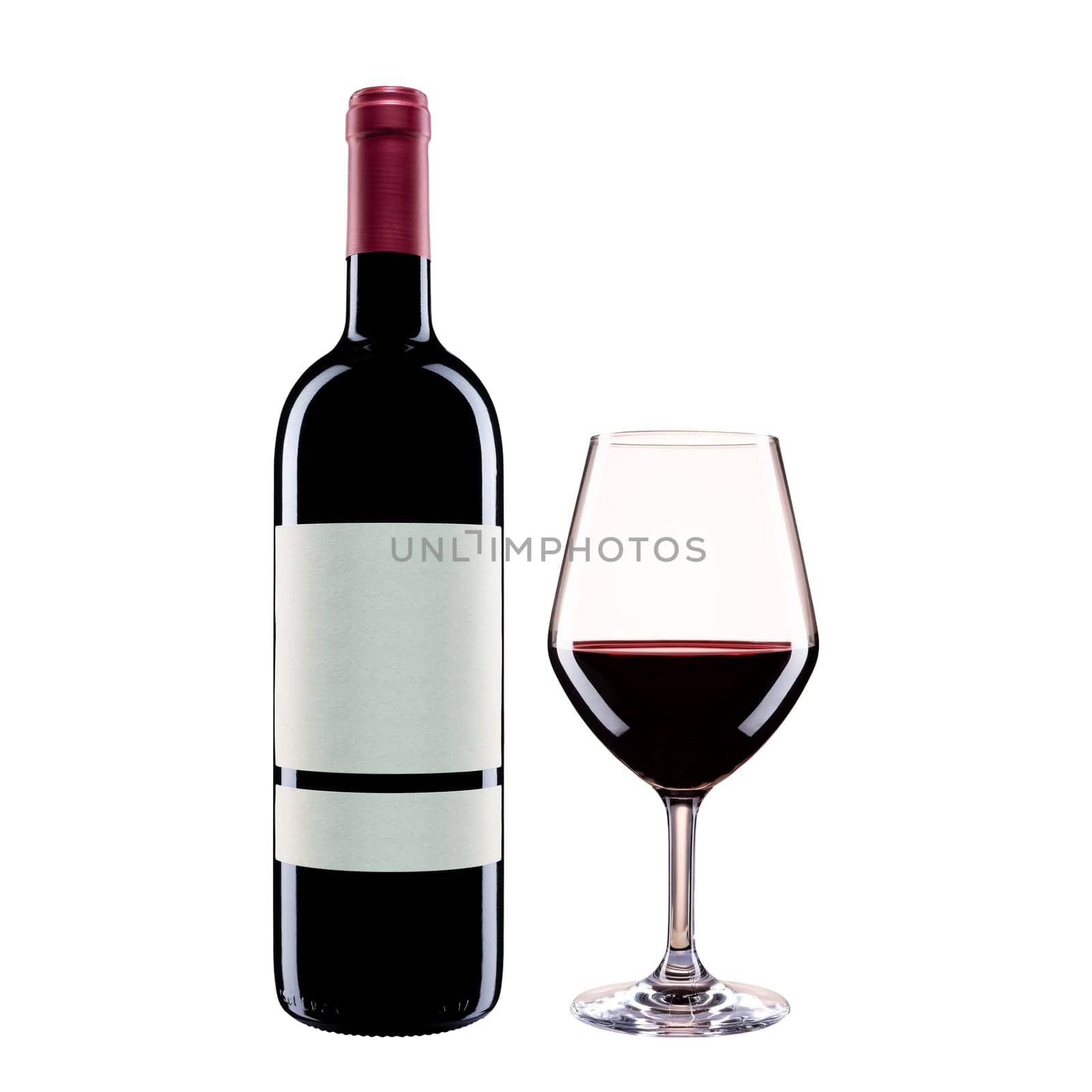 Close up of bottle and goblet of red wine isolated on white background. Food drinks.