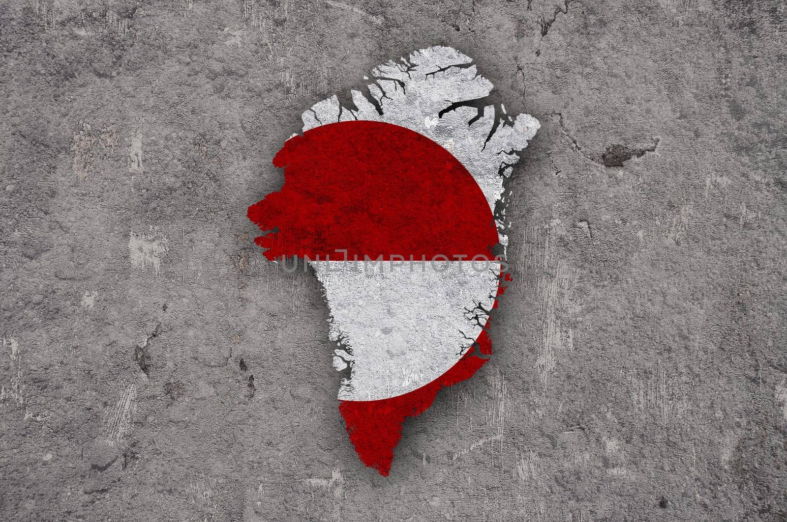 Map and flag of Greenland on weathered concrete