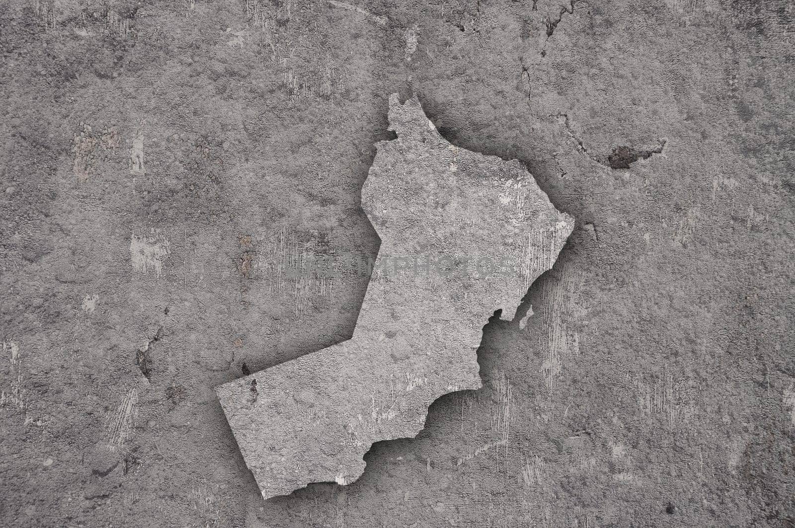 Map of Oman on weathered concrete