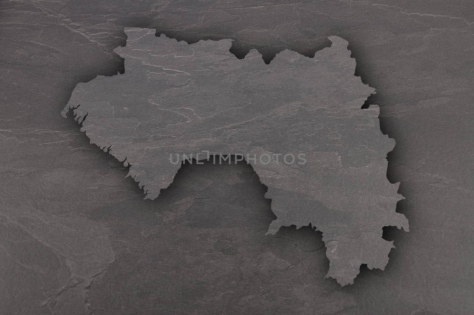 Map of Guinea on dark slate