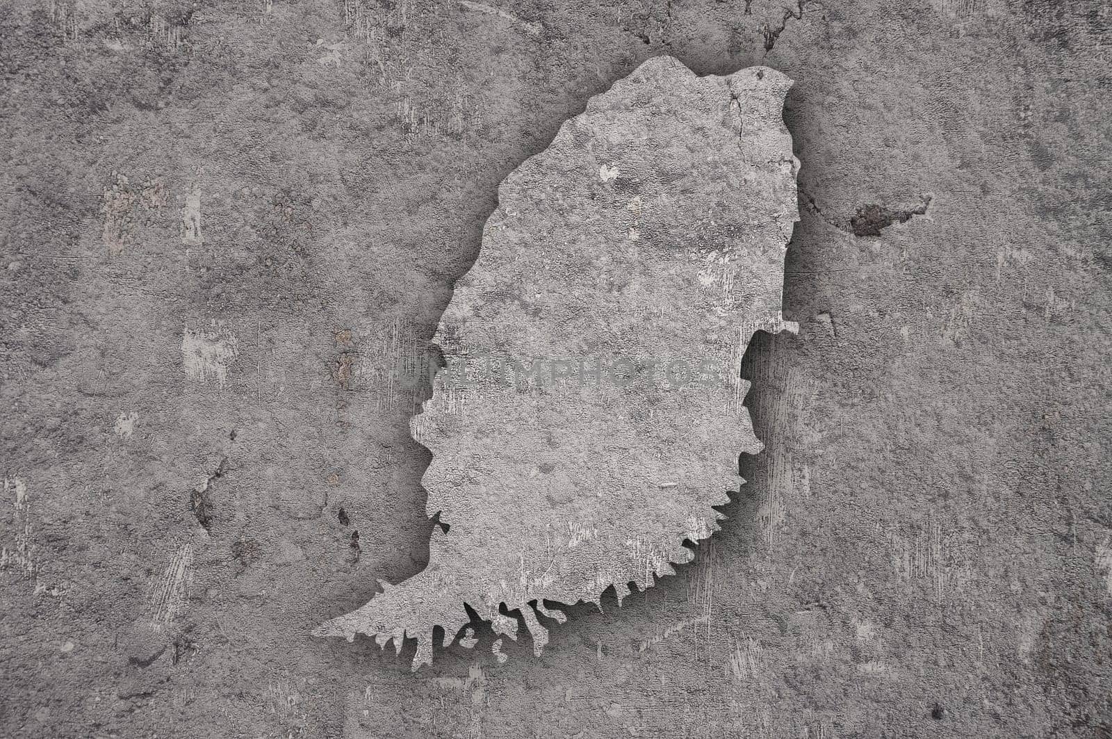 Map of Grenada on weathered concrete