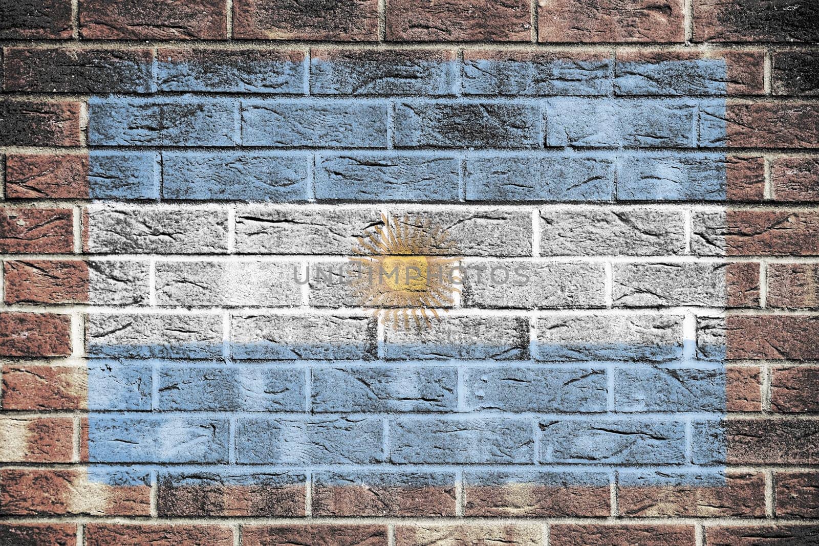 An Argentina flag on a brick wall background