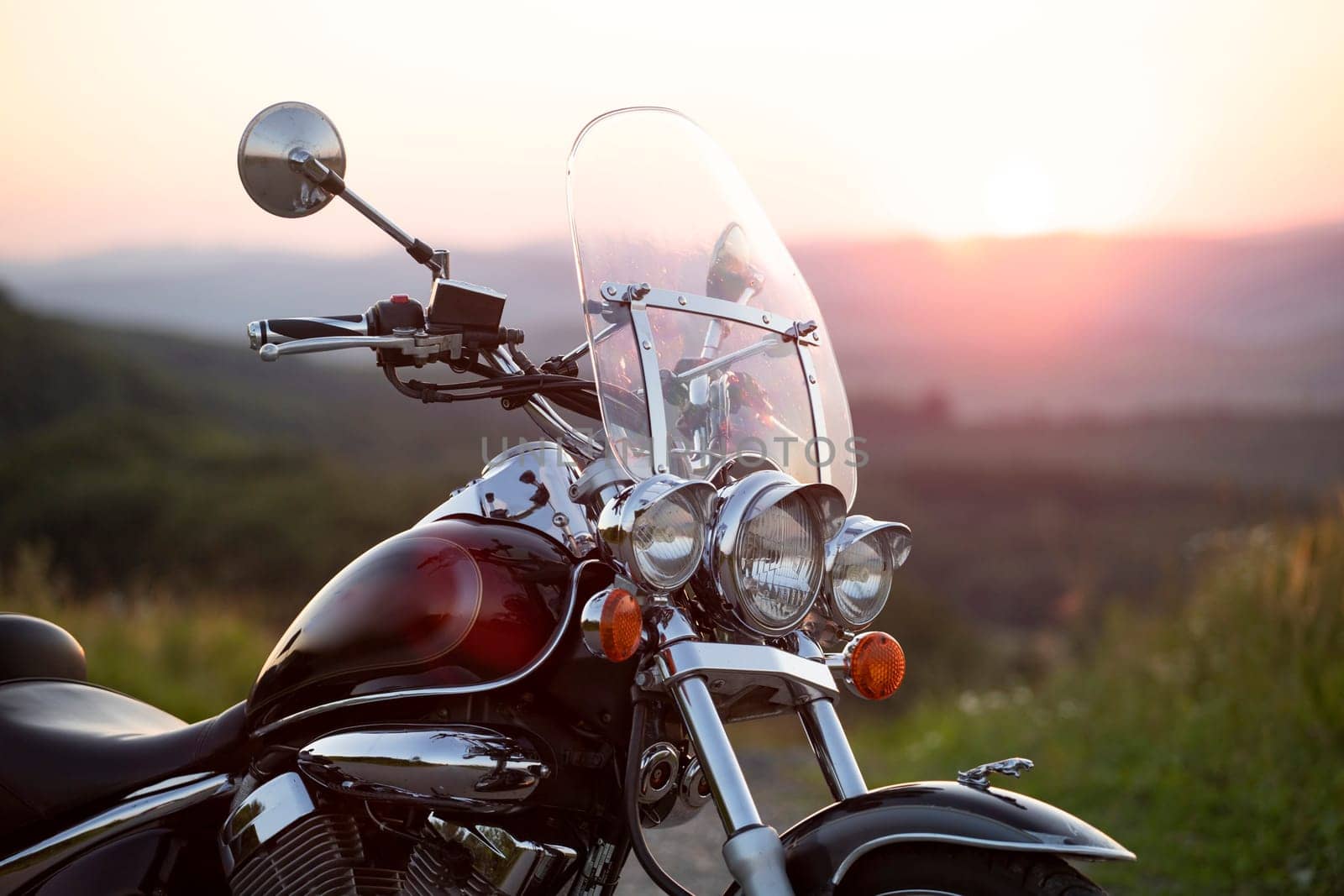 Motorcycle detail closeup front fork and headlight. Travel and sport, speed and freedom concept