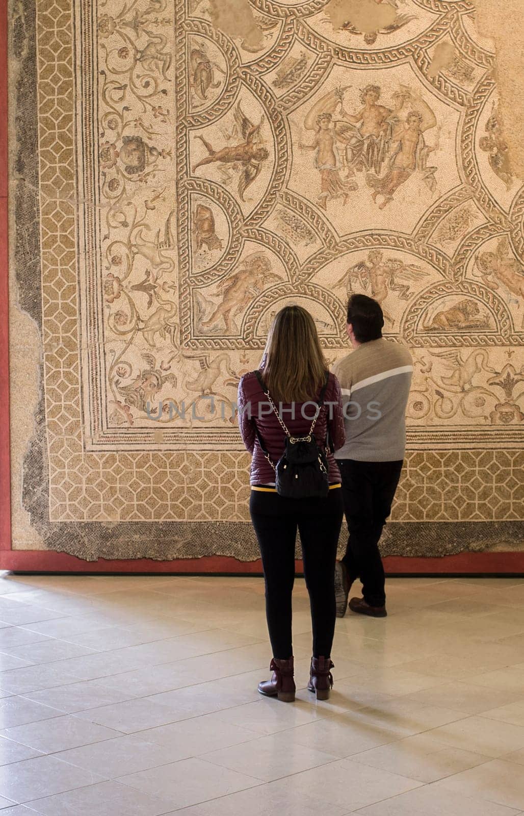 Ecija, Spain - April 21th, 2019: Visitors couple at Ecija Municipal Museum of History, Seville, Spain
