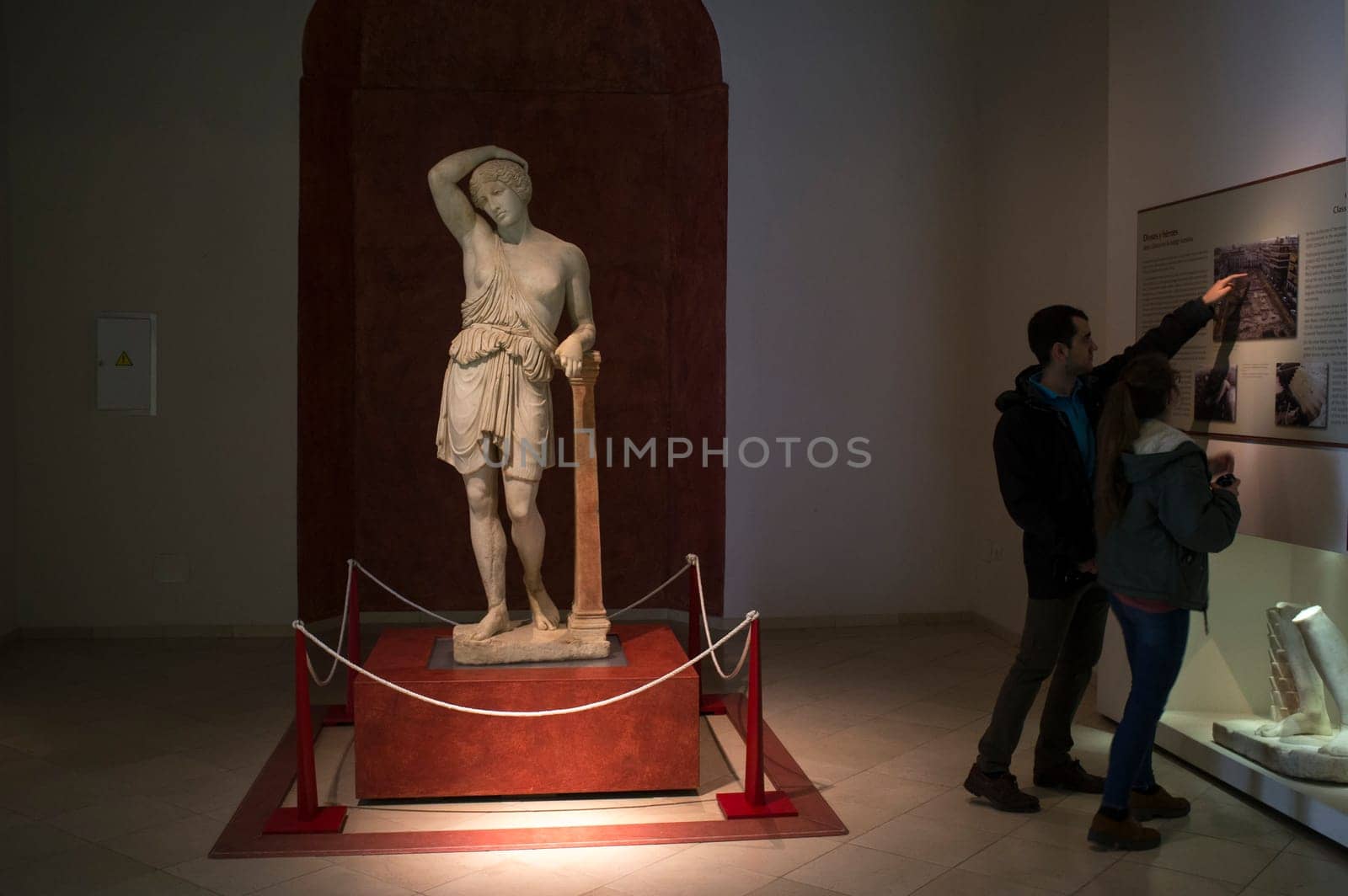 Ecija, Spain - April 21th, 2019: Visitors couple at Ecija Municipal Museum of History, Seville, Spain