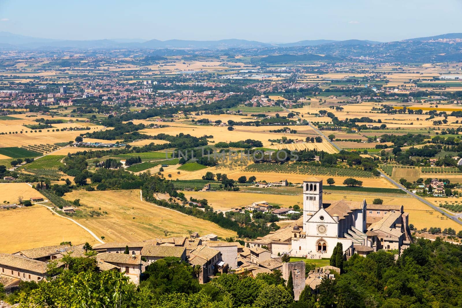 Assisi village in Umbria region, Italy. The town is famous for the most important Italian St. Francis Basilica (Basilica di San Francesco)