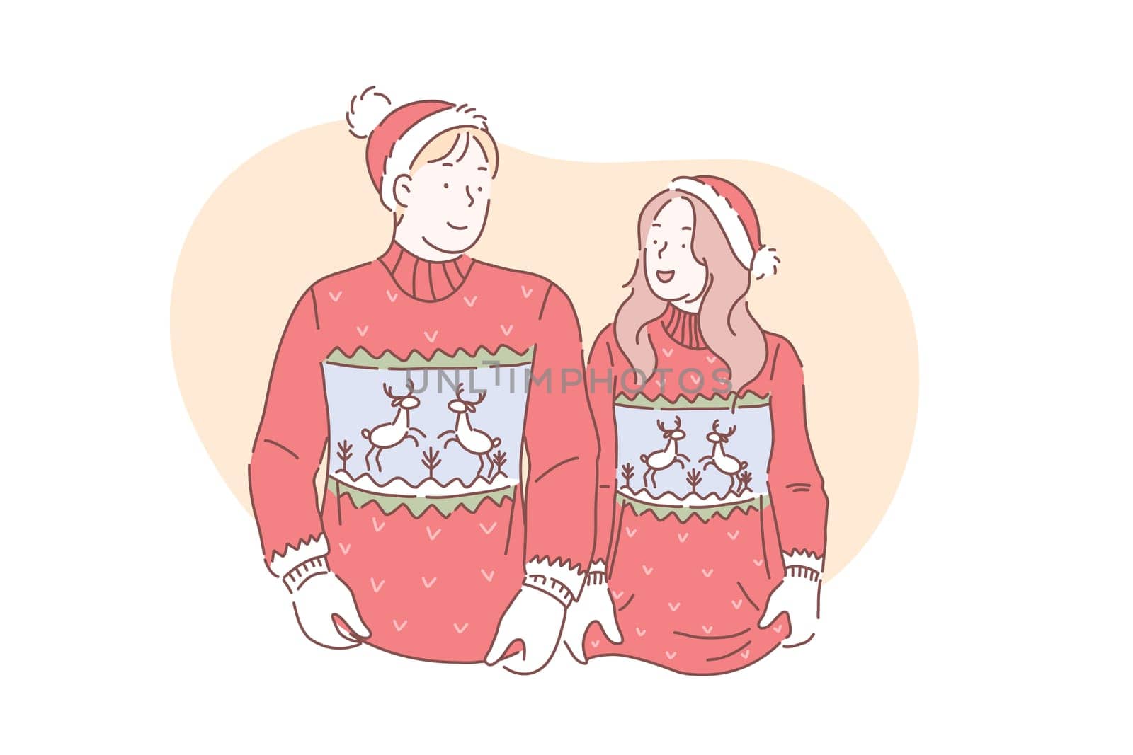 A young loving couple in christmas sweaters with deer are preparing to celebrate a Merry Christmas and Happy New year.