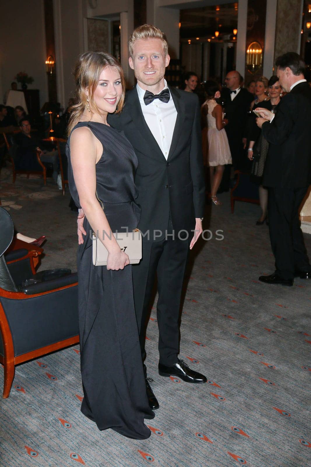 Andre Schuerrle with girlfriend Montana Yorke,charity event Blauer Ball 2015 at the Hotel Atlantic,Hamburg,11.04.2015
