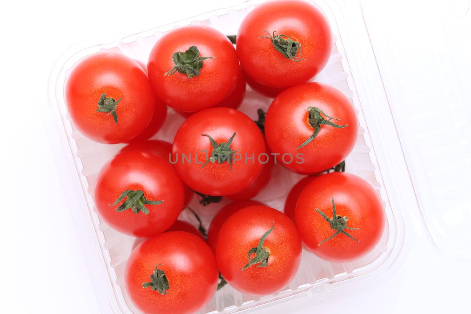 cherry tomatoes in a plastic container
