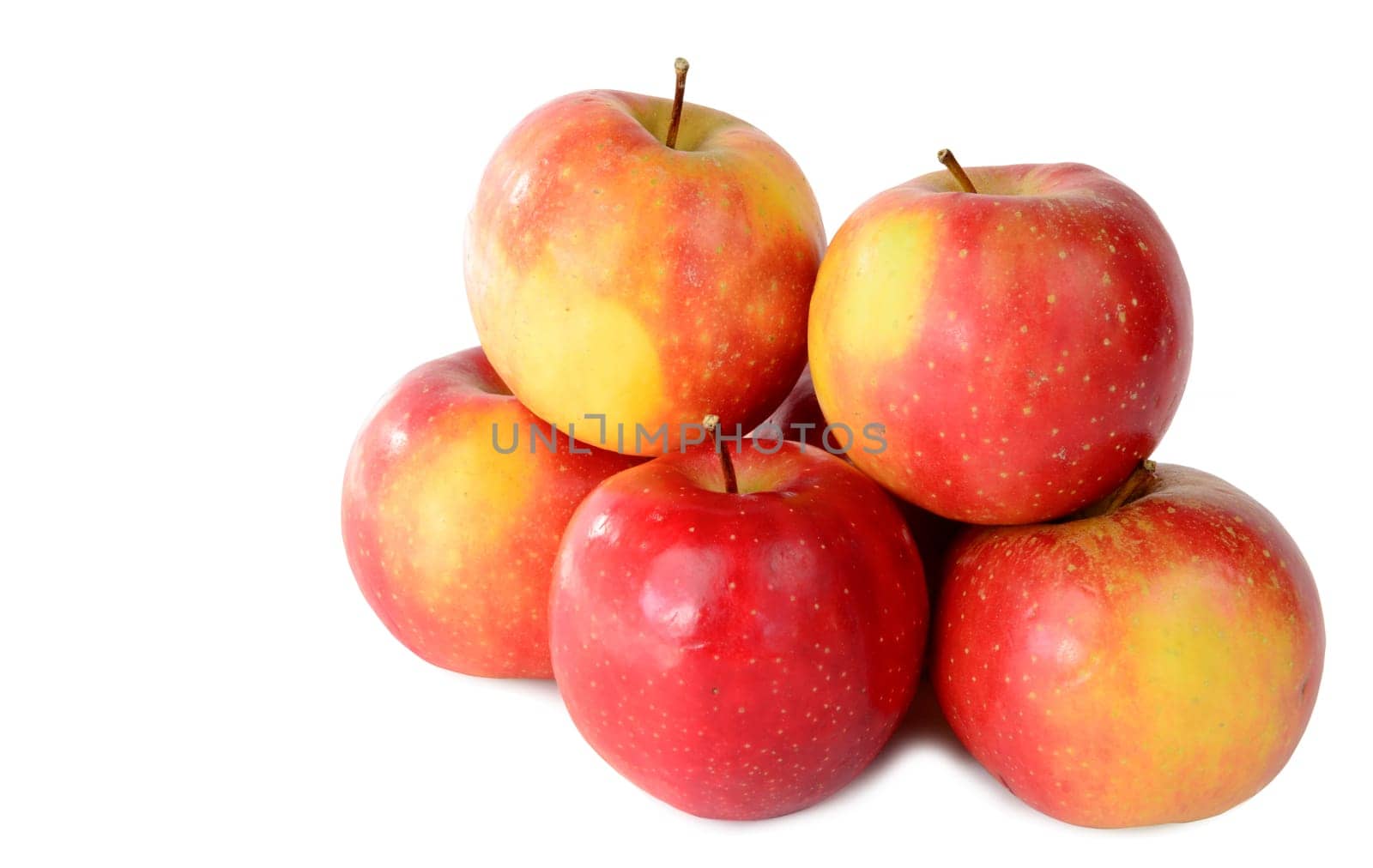 red and yellow apples on a white background