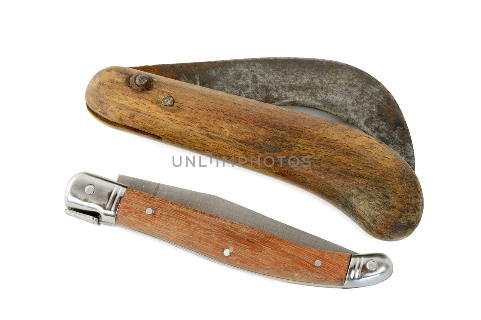 two old knifes with wooden handle on white