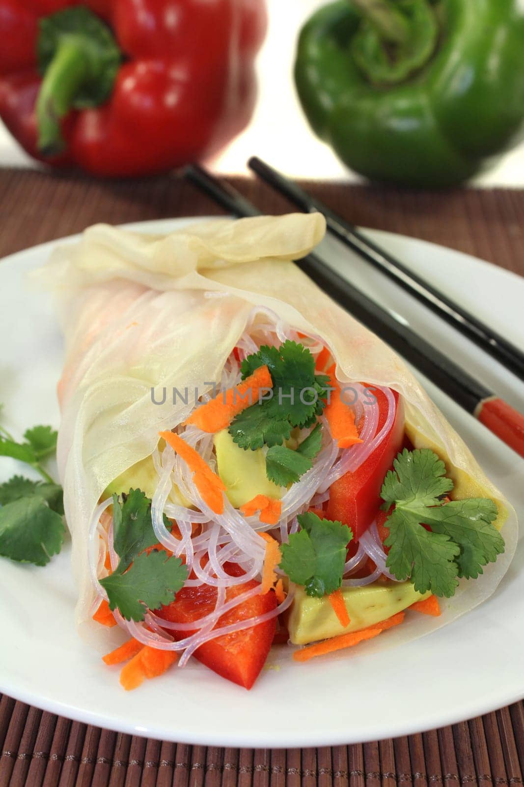 Rice paper stuffed with glass noodles,carrots,peppers and coriander