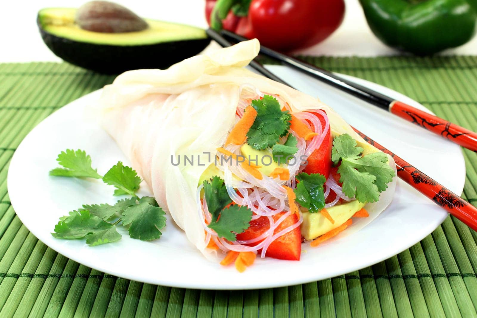 Rice paper stuffed with glass noodles,carrots,peppers and coriander