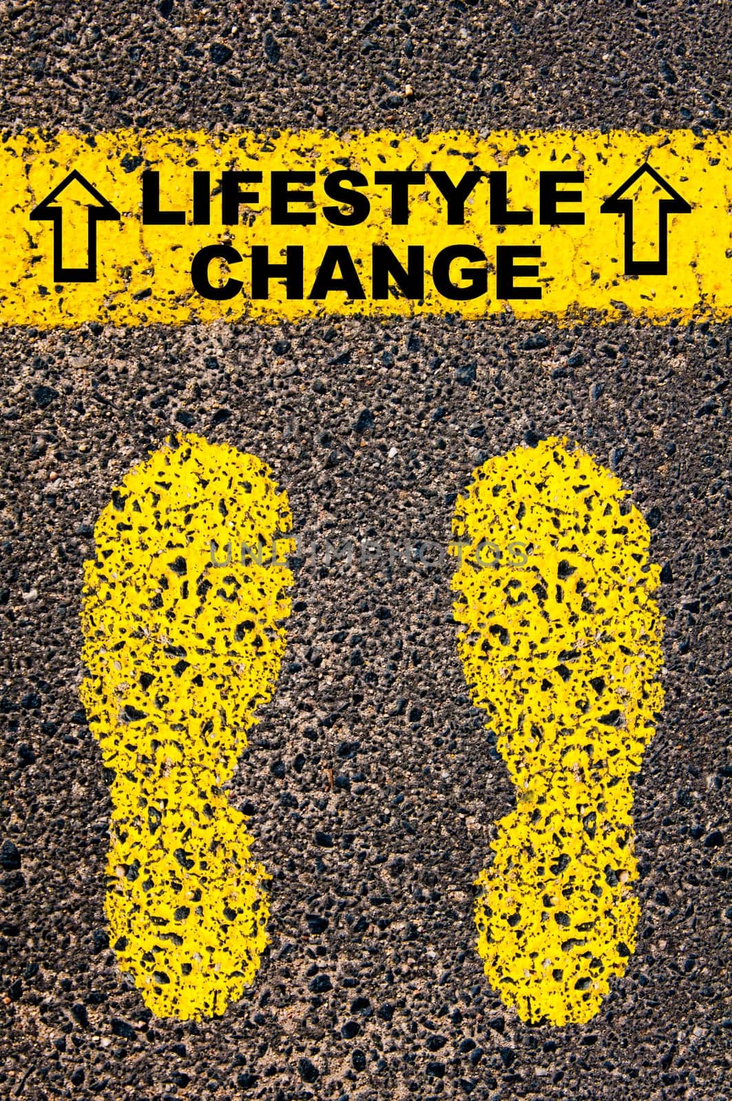 Conceptual image with yellow paint footsteps on the road in front of horizontal line over asphalt stone background. Word XXXXXXXX