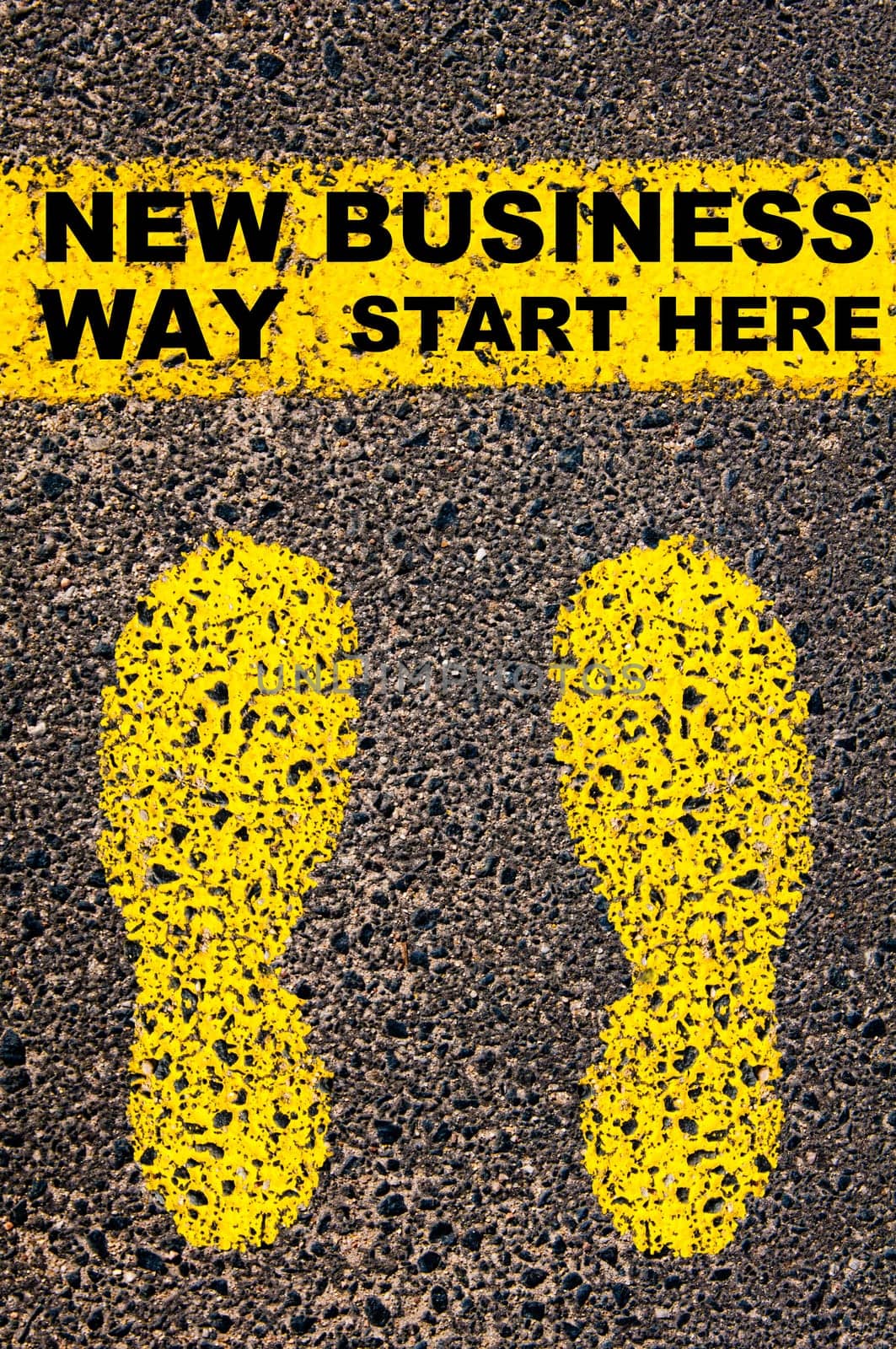 Conceptual image with yellow paint footsteps on the road in front of horizontal line over asphalt stone background. Word XXXXXXXX