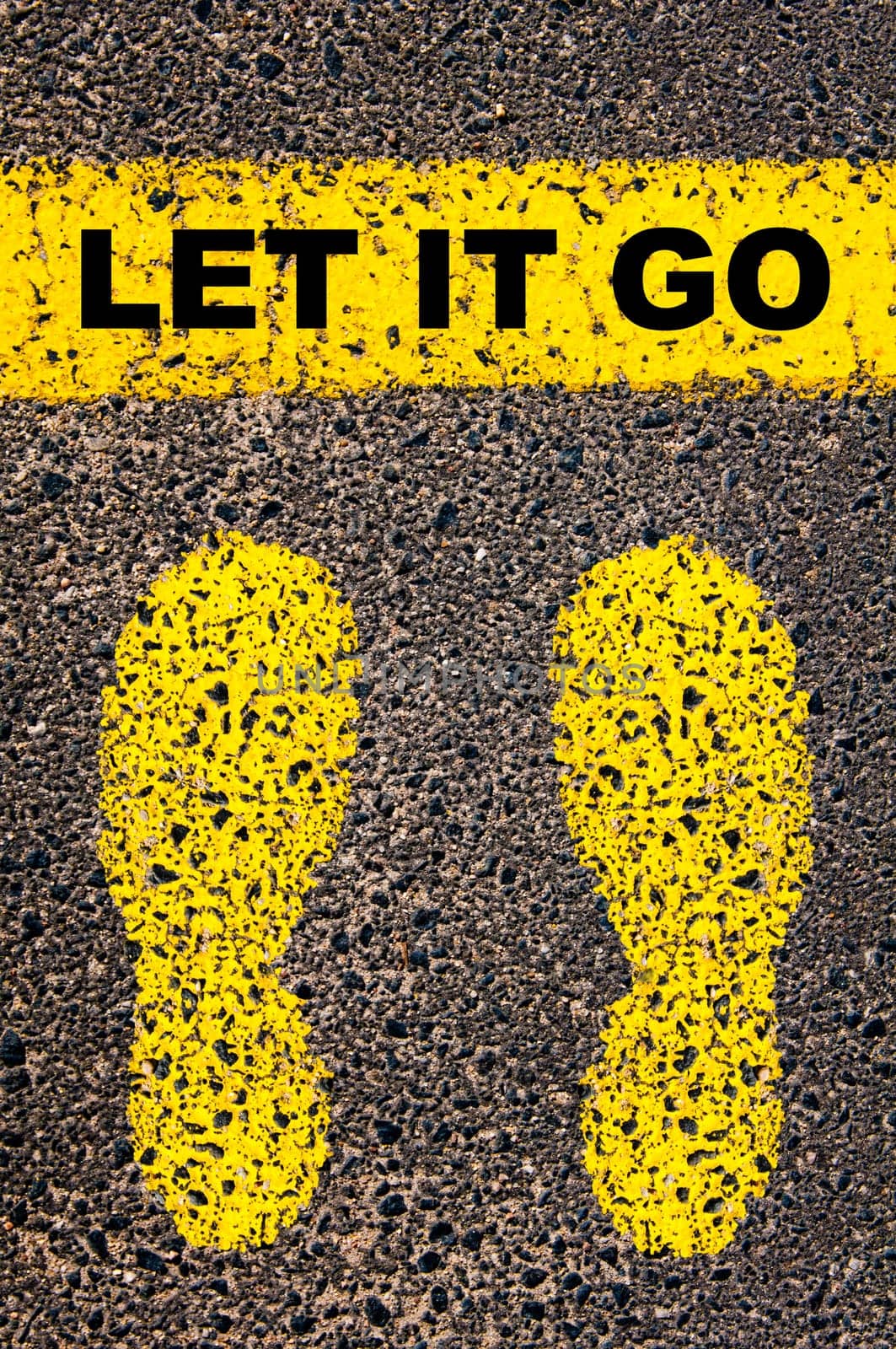 Conceptual image with yellow paint footsteps on the road in front of horizontal line over asphalt stone background. Word XXXXXXXX