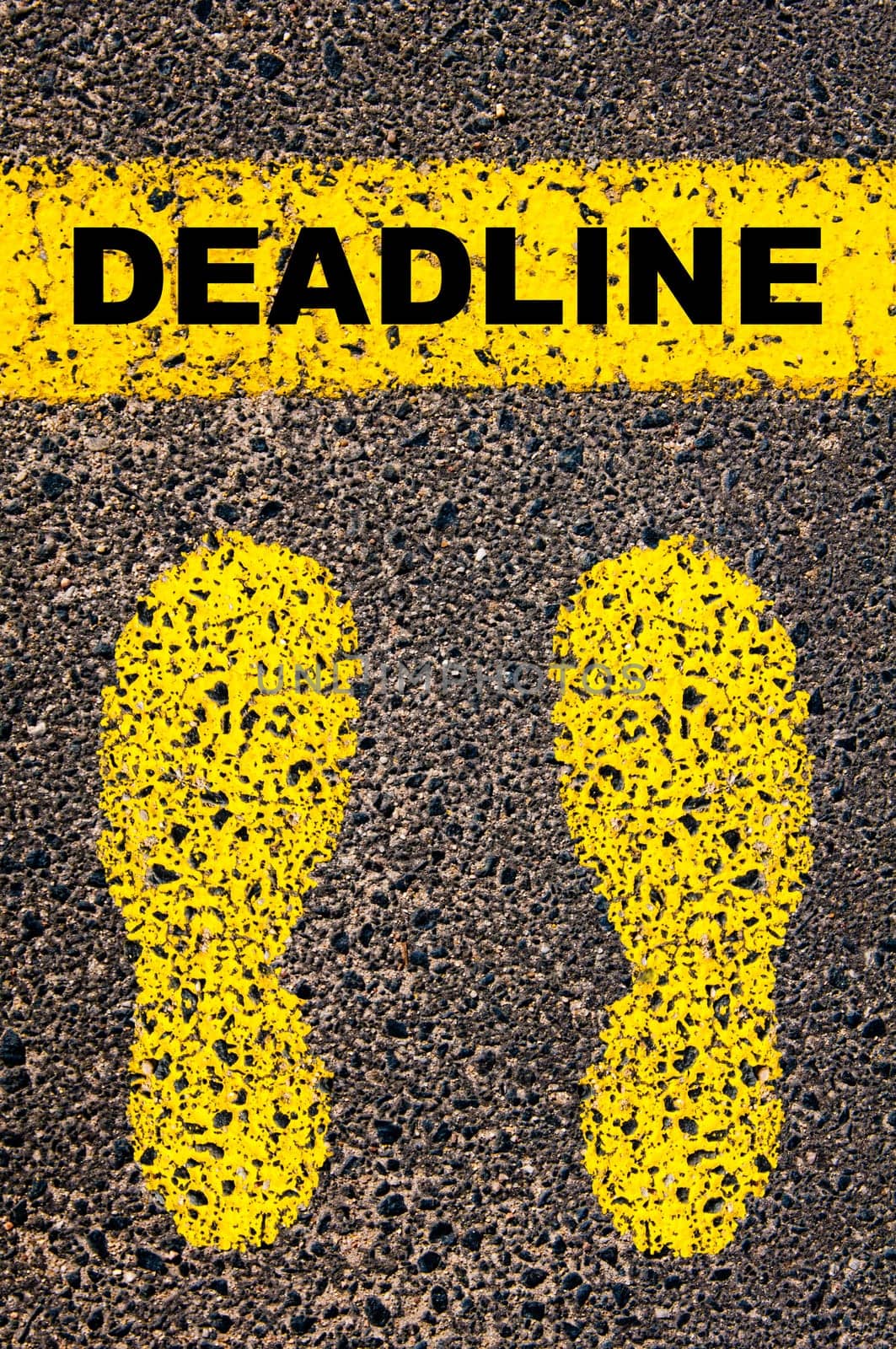 Conceptual image with yellow paint footsteps on the road in front of horizontal line over asphalt stone background. Word XXXXXXXX